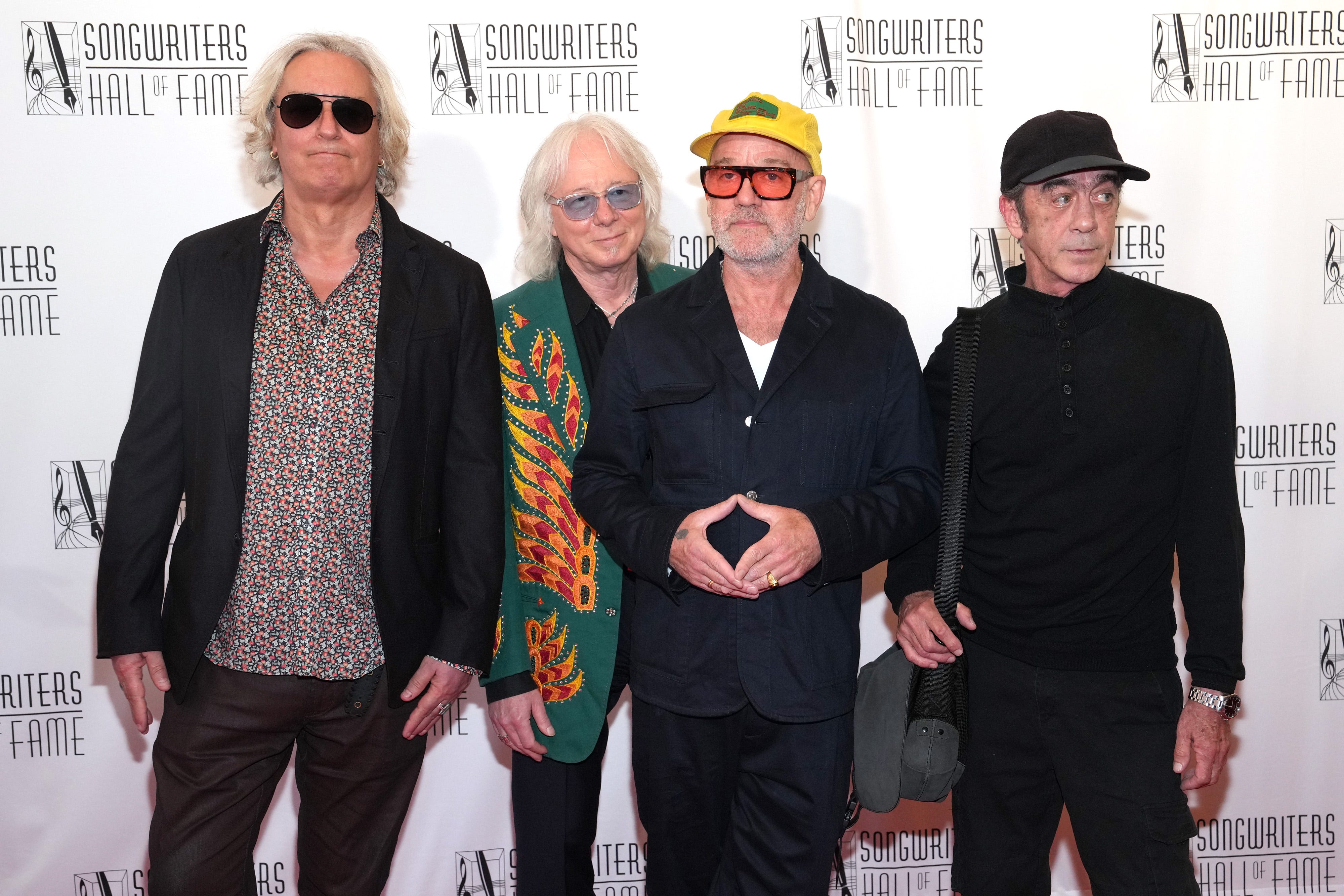 Peter Buck, Mike Mills, Michael Stipe and Bill Berry, of R.E.M., attend the 2024 Songwriters Hall of Fame Induction and Awards Gala on June 13, 2024, in New York City.