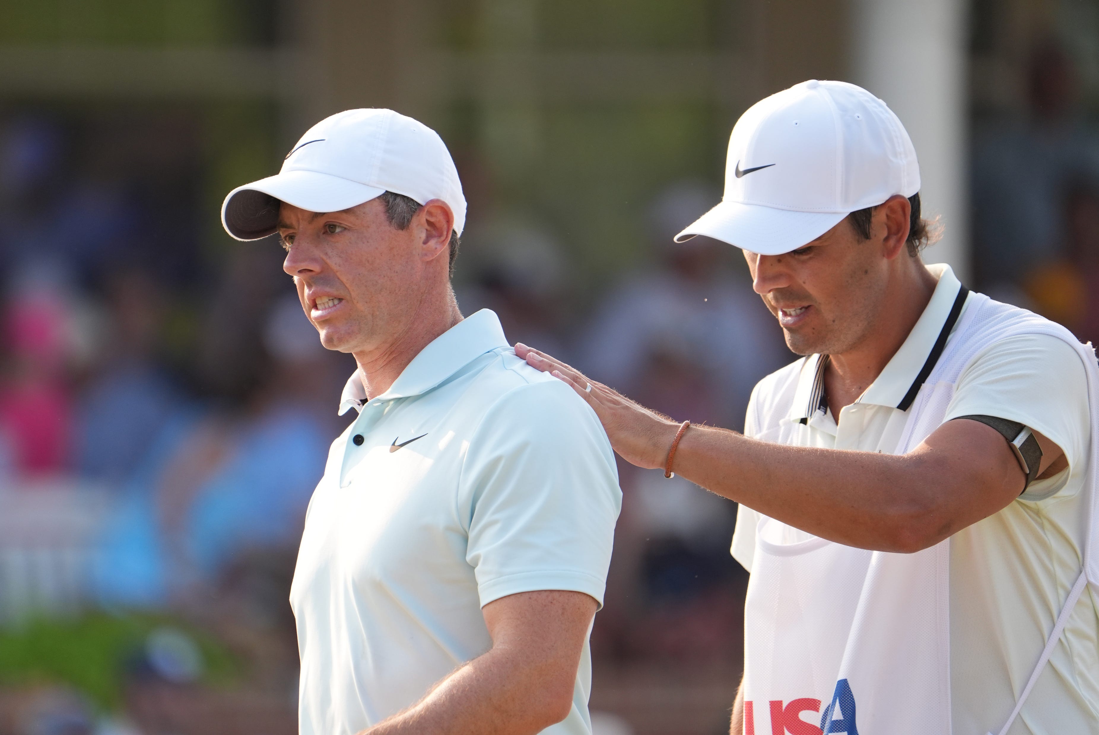 Jun 16, 2024; Pinehurst, North Carolina, USA; Rory McIlroy reacts after a missed putt on the eighteenth green during the final round of the U.S. Open golf tournament. Mandatory Credit: John David Mercer-USA TODAY Sports
