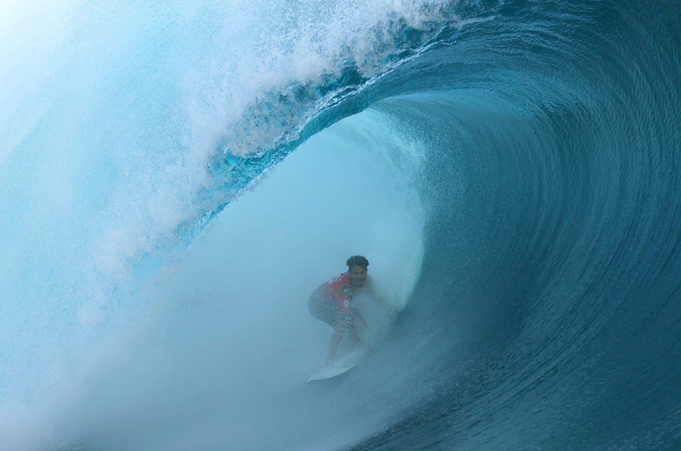 Brazil's Italo Ferreira surfs a wave in Teahupo'o, Tahiti, on May 30, 2024.