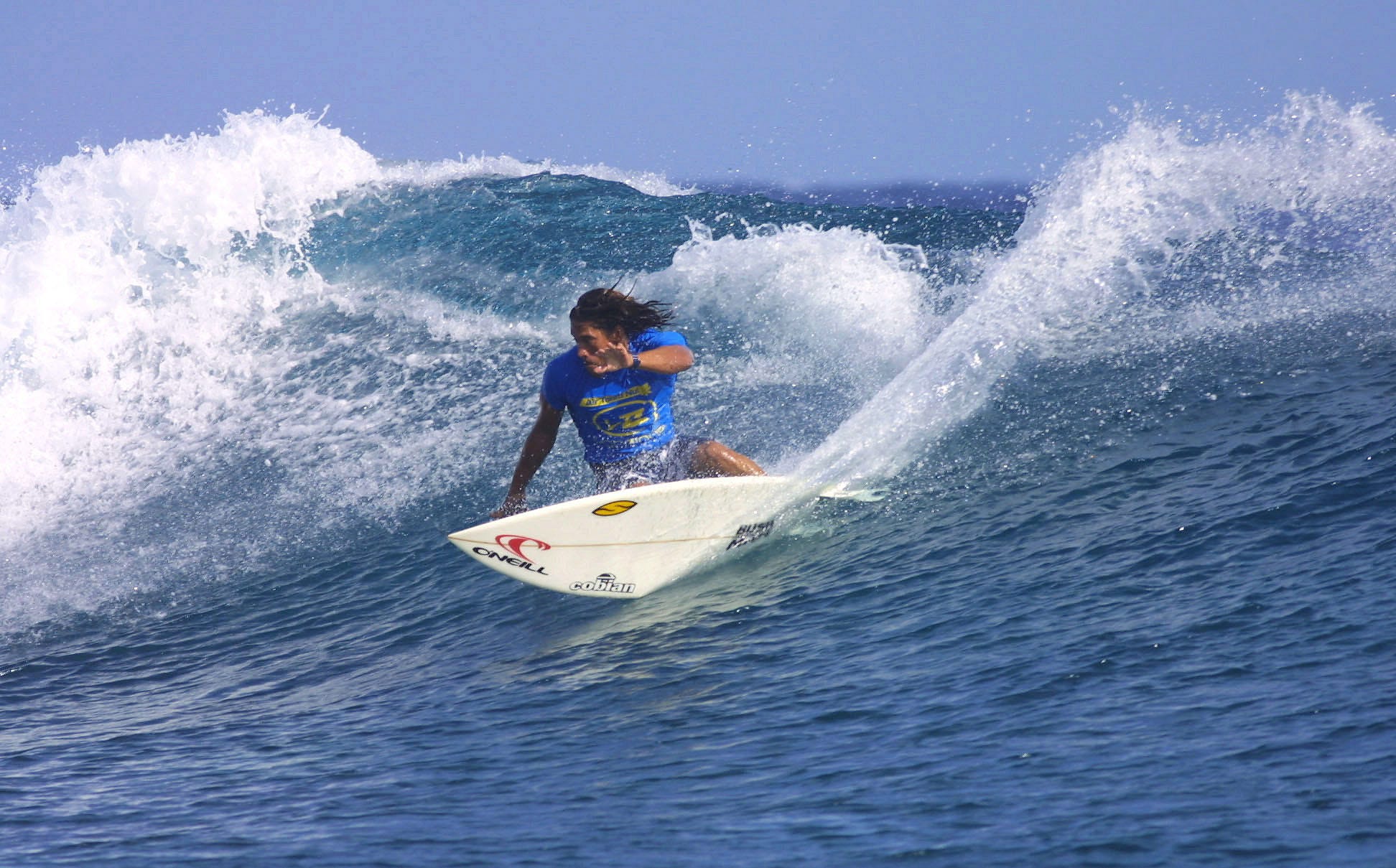 Tamayo Perry of Hawaii surfing during the Billabong Pro professional surfing competition trials in Teahupoo, Tahiti, French Polynesia, in 2003. Perry died June 23 at age 49 from a supposed shark attack.