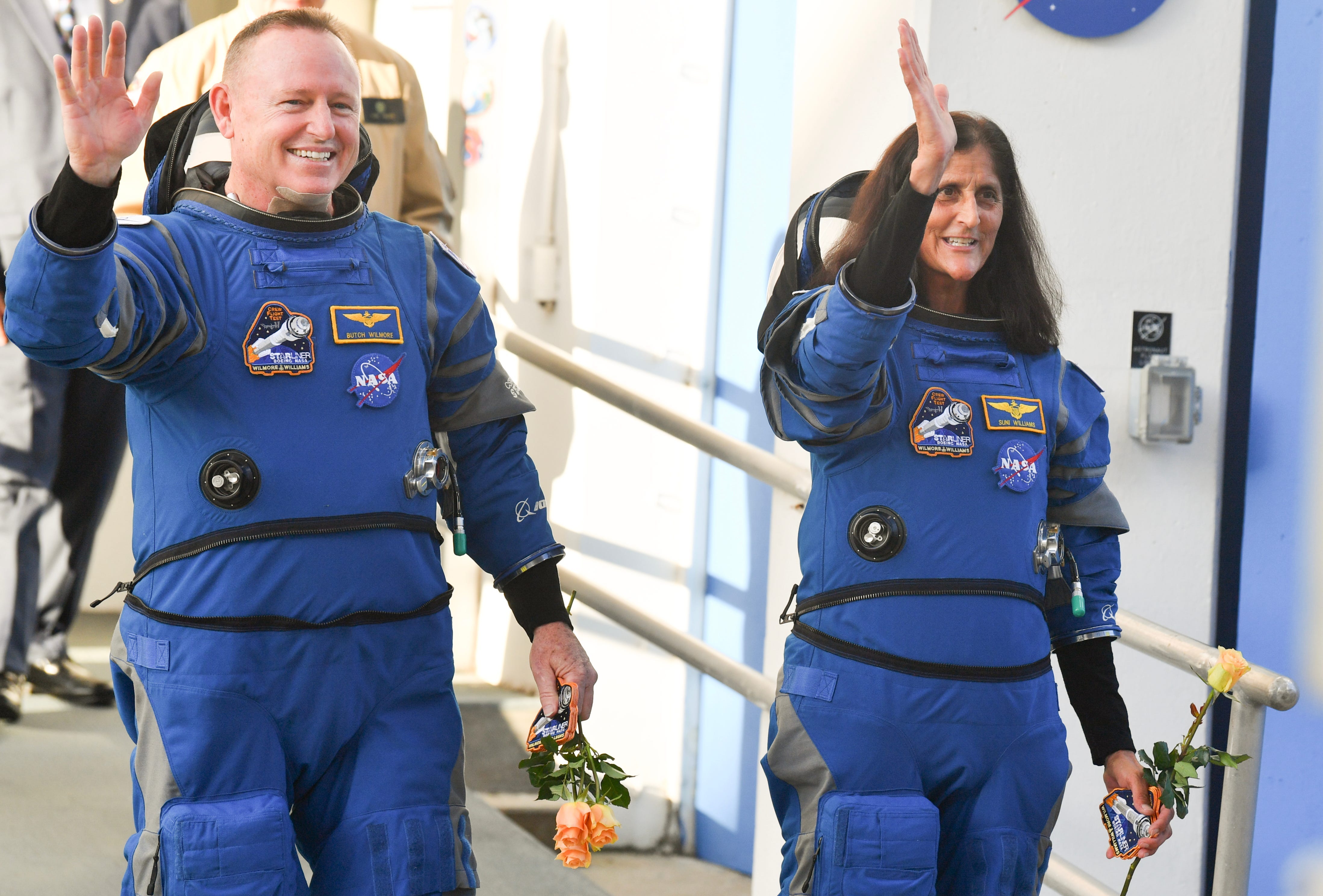 NASA astronauts Suni Williams and Butch Wilmore say goodbye to friends and family as they leave astronaut crew quarters on their way to the launch pad Wednesday, June 5, 2024.