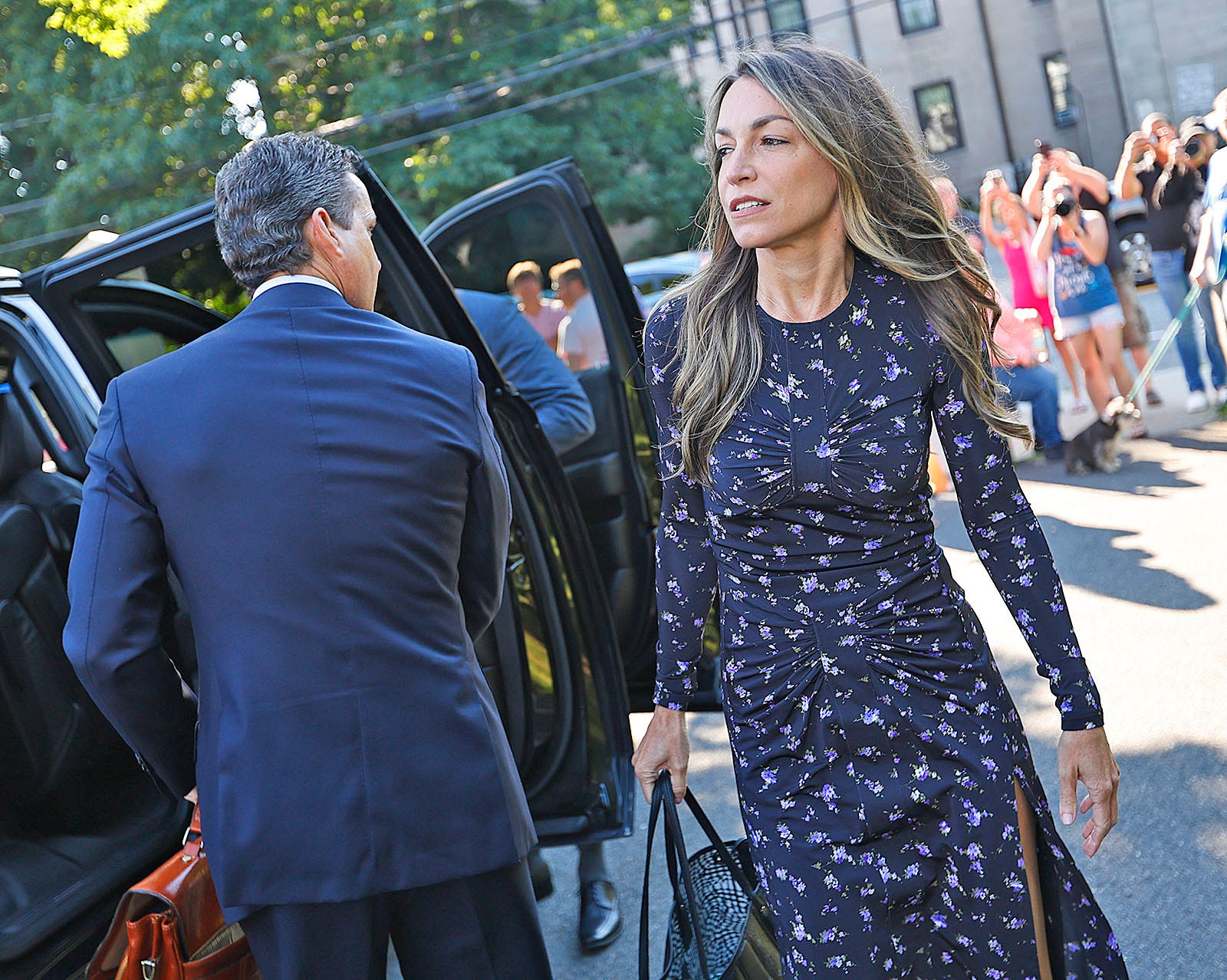 Karen Read arrives at Dedham Superior Court with her lawyer Alan Jackson on Tuesday, June 25, 2024.