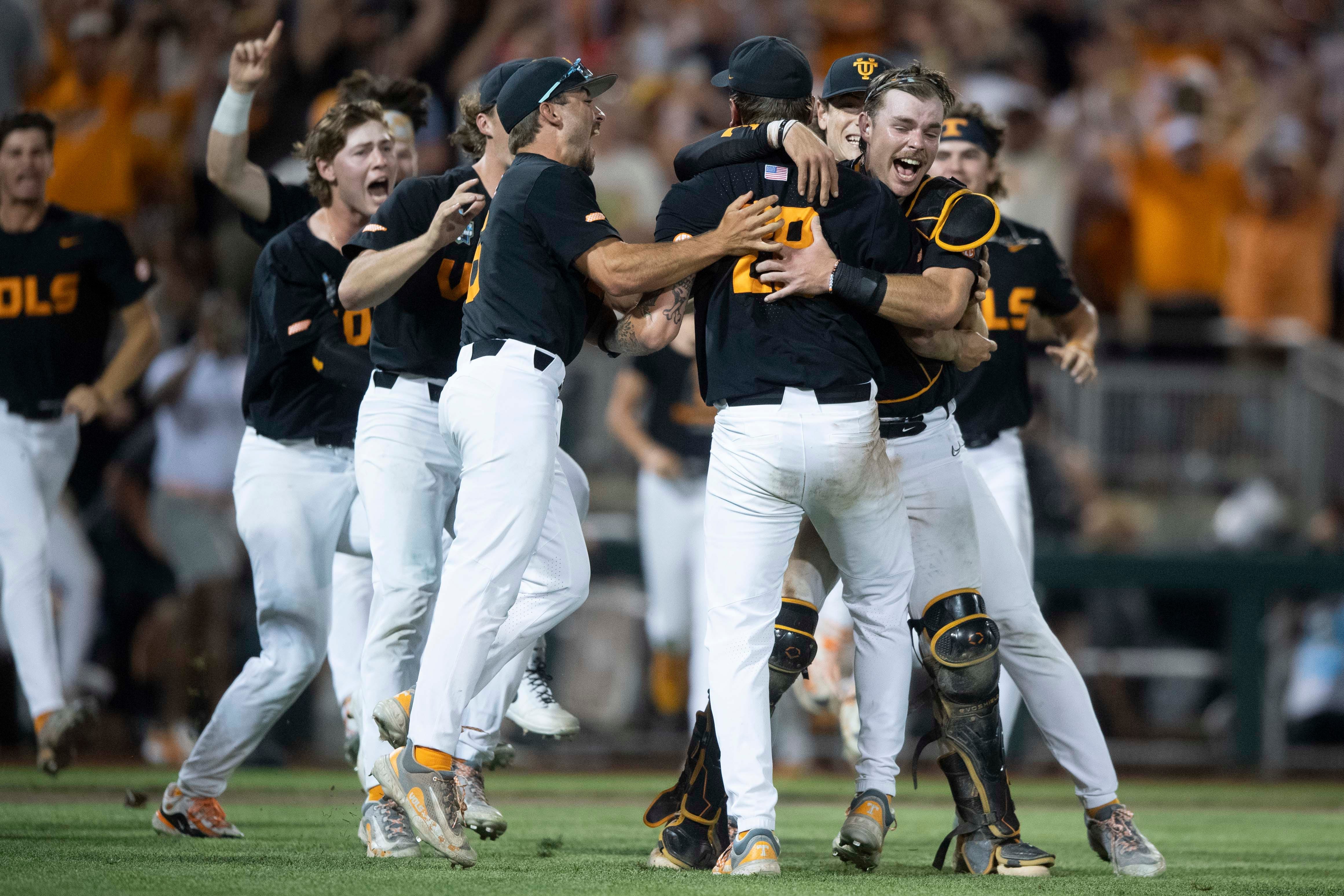 Tennessee players celebrate after defeating Texas A&M to win the college baseball national title in Game 3 of the College World Series at Charles Schwab Field in Omaha, Neb., on Monday, June 24, 2024.