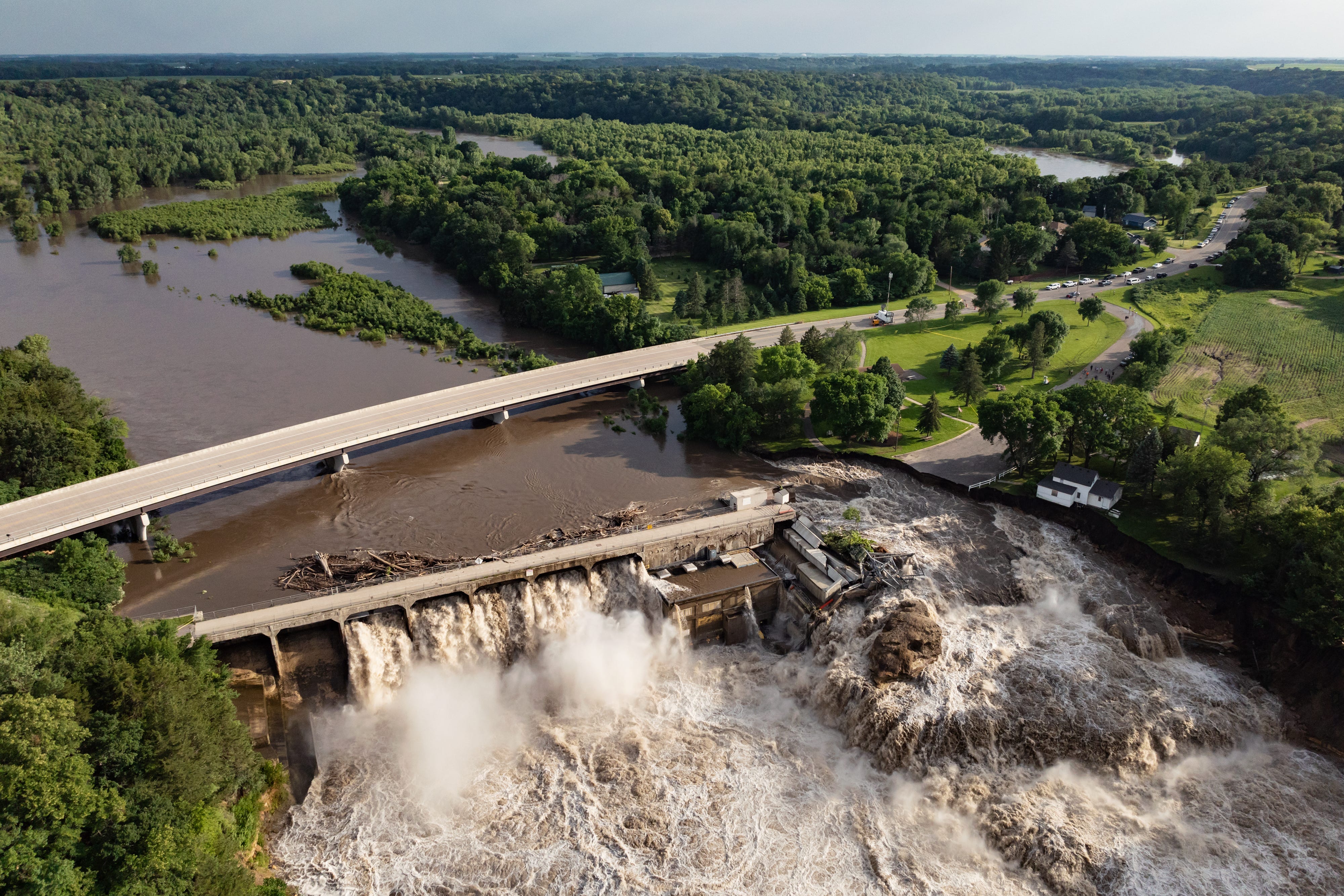 High water levels at the Rapidan Dam on the Blue Earth River in Mankato, Minnesota, US, on Monday, June 24, 2024. A dam holding back swollen flood waters in Minnesota was at risk of failure Monday as intense weather buffeted much of the US.