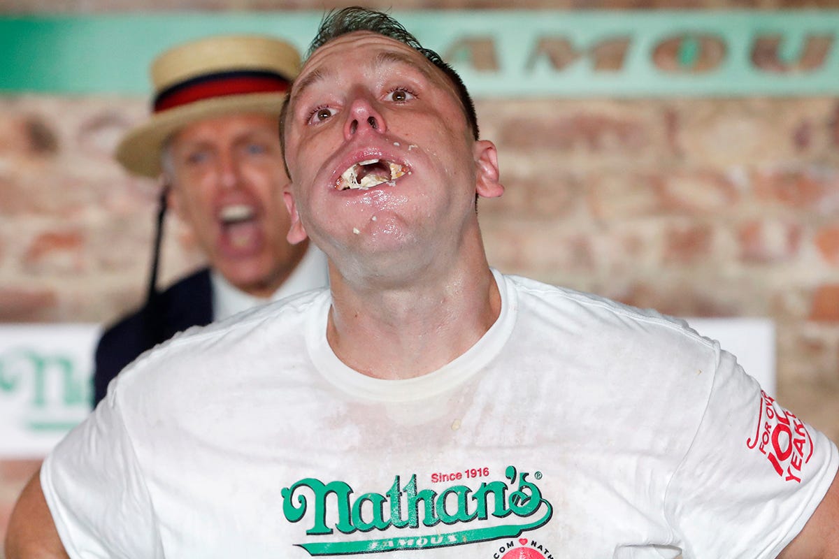 Joey Chestnut reacts after winning the Nathan's Famous Fourth of July International Hot Dog Eating Contest with a world record 75 hot dogs consumed in Brooklyn, in New York City on July 4, 2020.