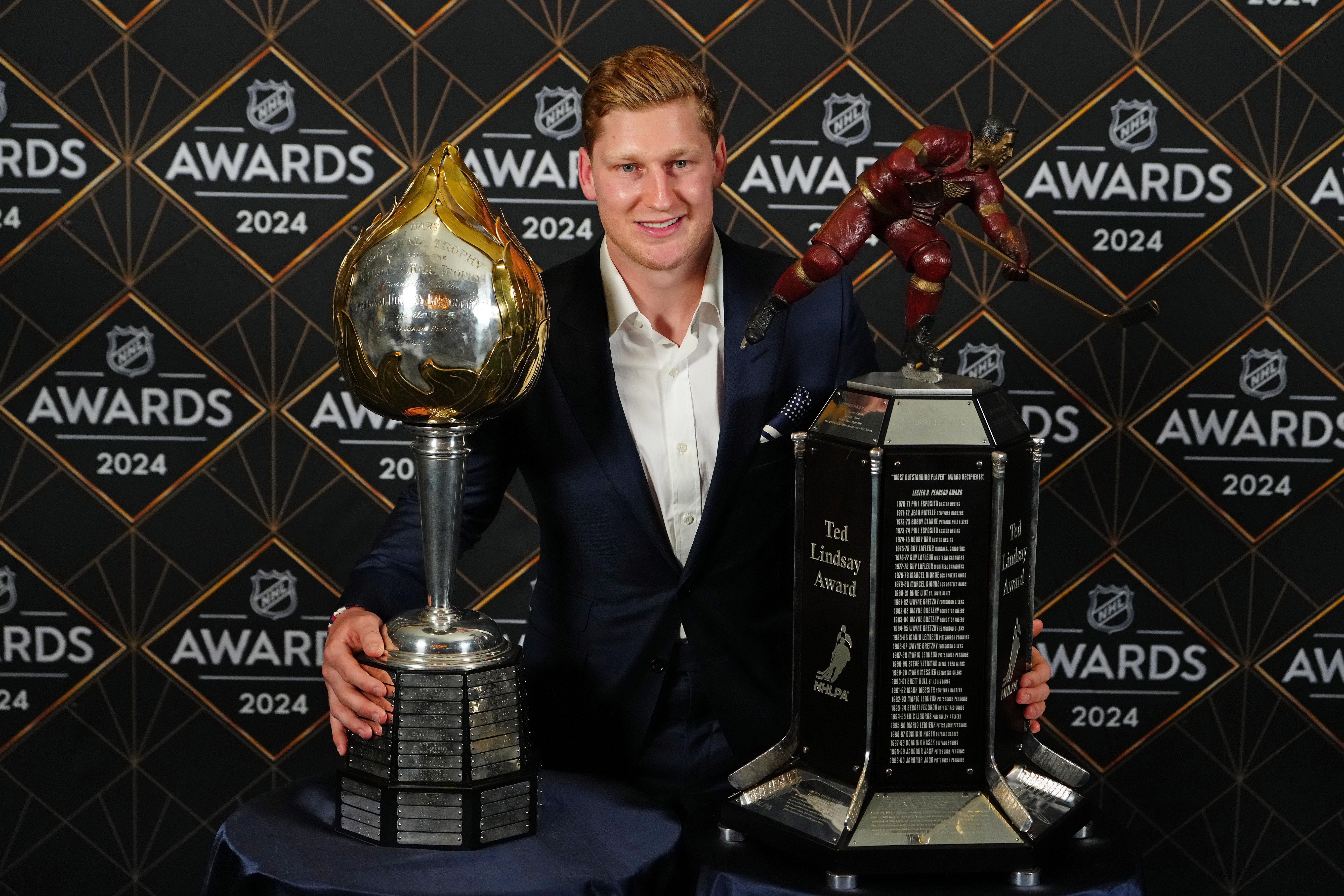 Colorado Avalanche superstar Nathan MacKinnon was awarded the Hart Trophy and the Ted Lindsay Award on Thursday night. Award winners and point totals.