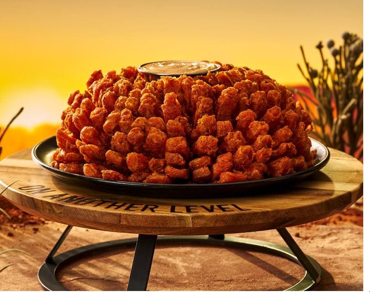 Outback Steakhouse will offer customers a free Bloomin' Onion through Friday with the purchase of an adult entree and a National Onion Day mention.
