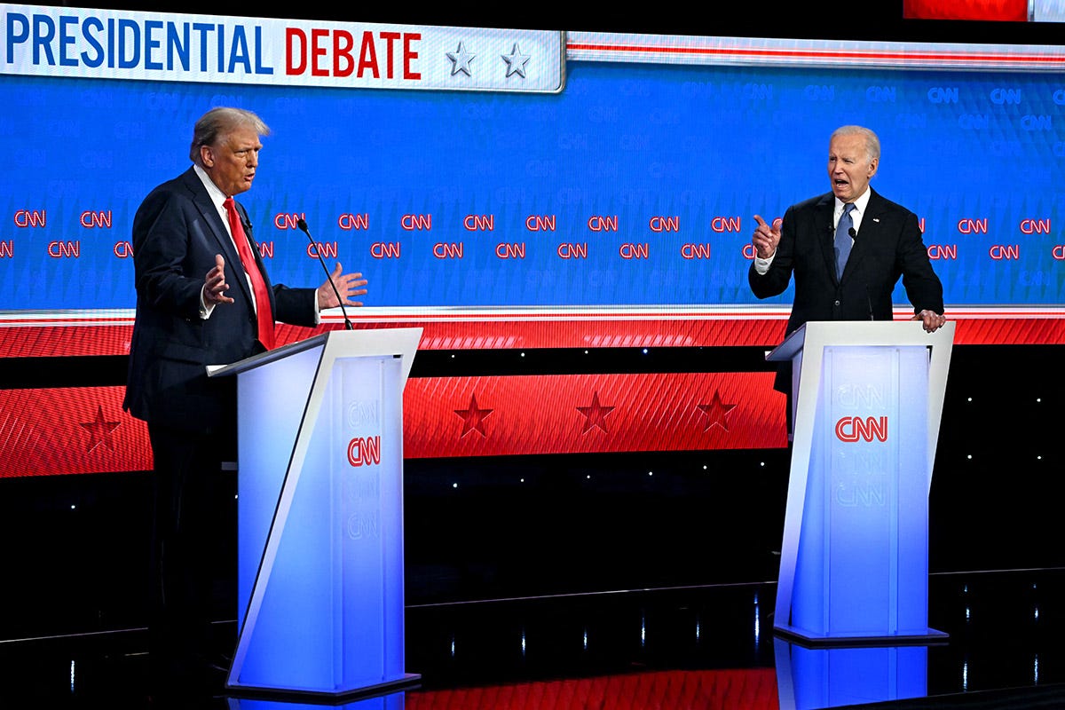 US President Joe Biden and former US President and Republican presidential candidate Donald Trump participate in the first presidential debate of the 2024 elections at CNN's studios in Atlanta, Georgia, on June 27, 2024.