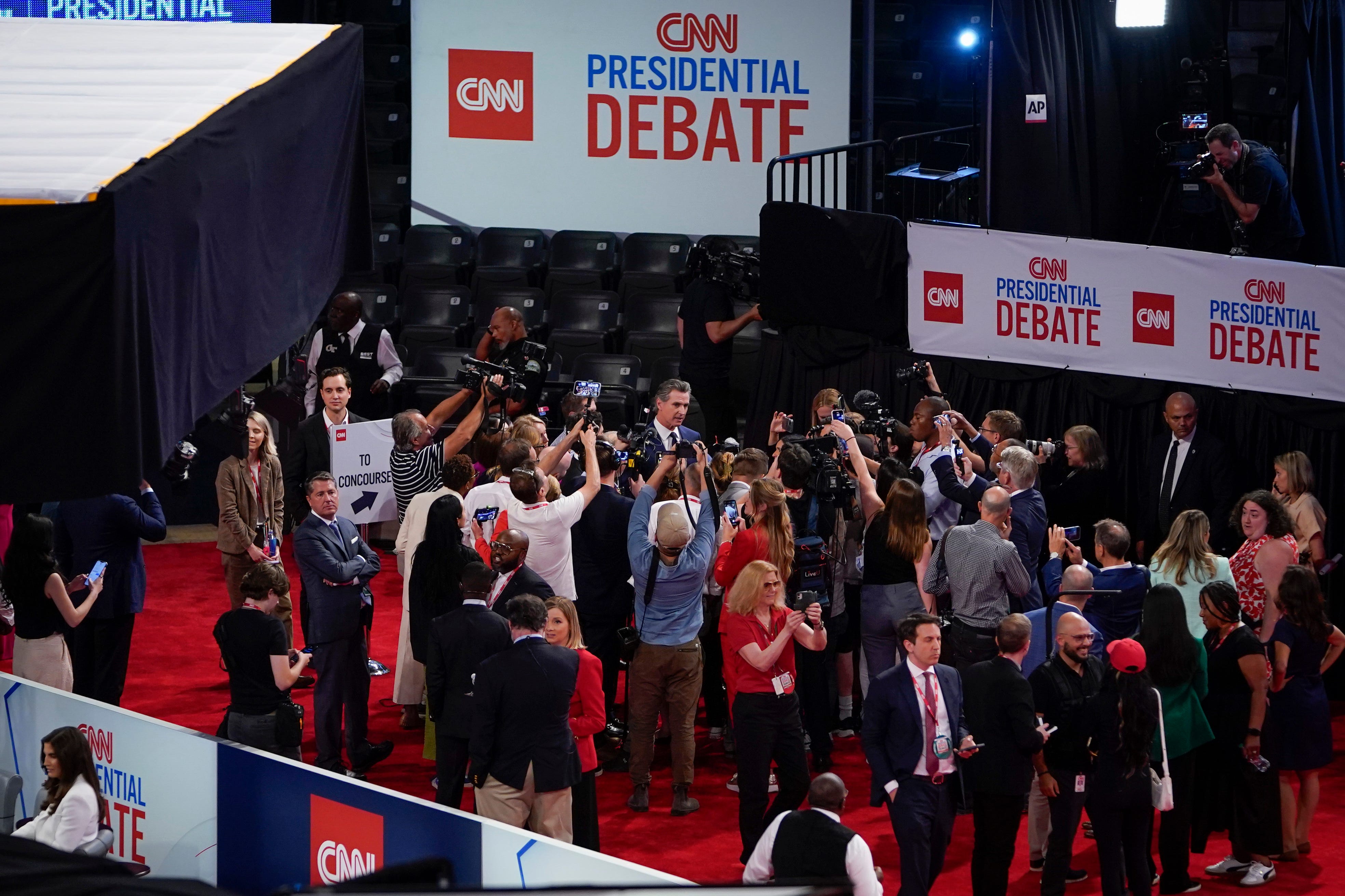 Jun 27, 2024; Atlanta, GA, USA; California Governor Gavin Newsom speaks to gathering of media at the Georgia Techâ€™s McCamish Pavilion prior to the CNN Presidential Debate between President Joe Biden and former President Donald Trump held at CNN's studios in Atlanta. CNN Anchors Jake Tapper and Dana Bash are moderators of the debate. Mandatory Credit: Jack Gruber-USA TODAY