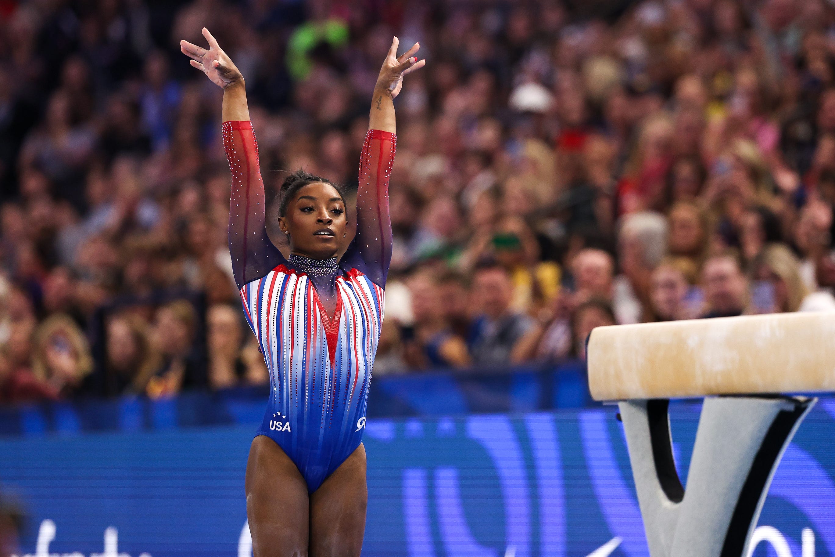 Simone Biles, competing on the balance beam during the U.S. gymnastics trials, is heading to her third Olympics.