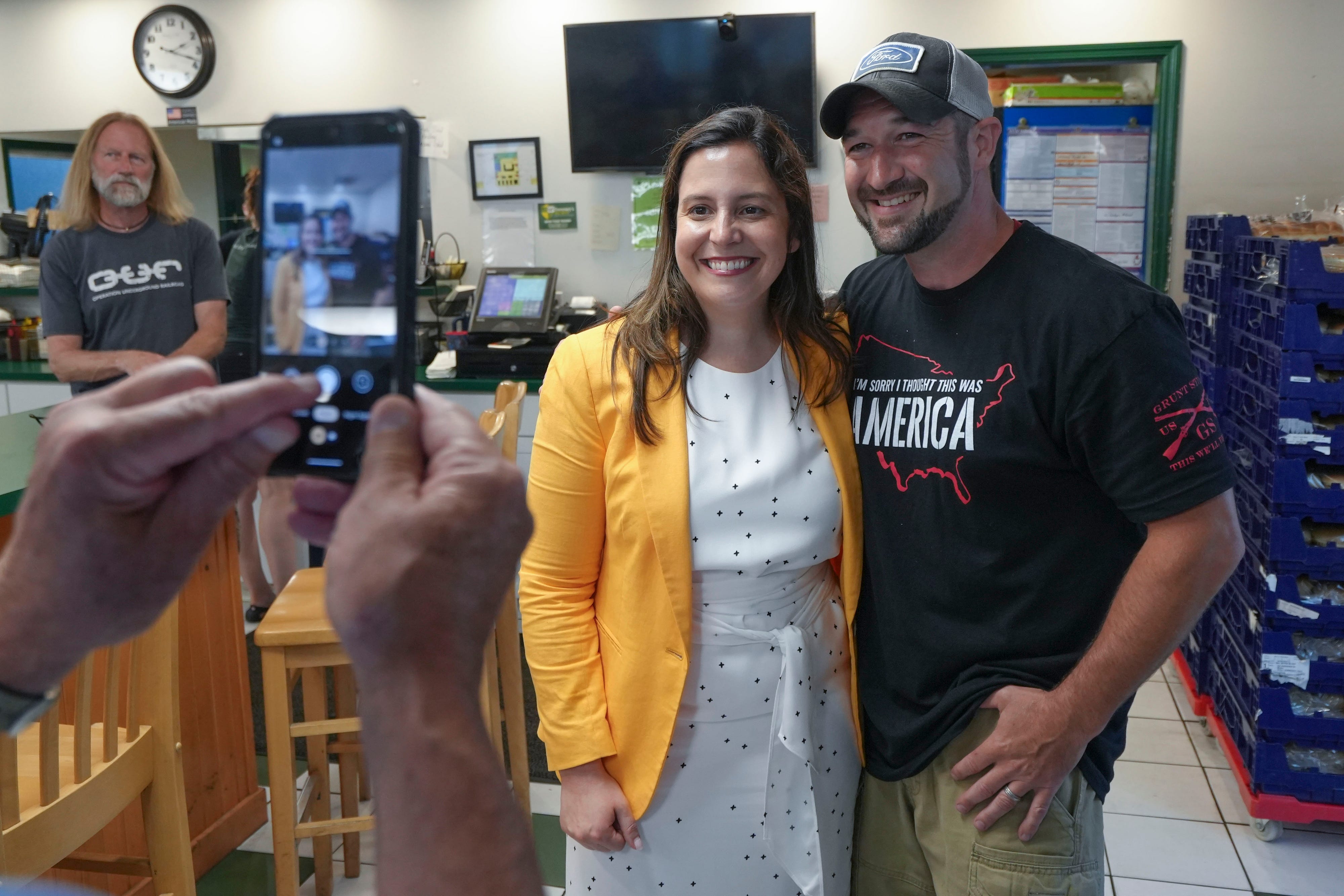 Congresswomen Elise Stefanik meets with fellow New Yorker Joshua Poitras at McSweeney's Red Hots in upstate New York.