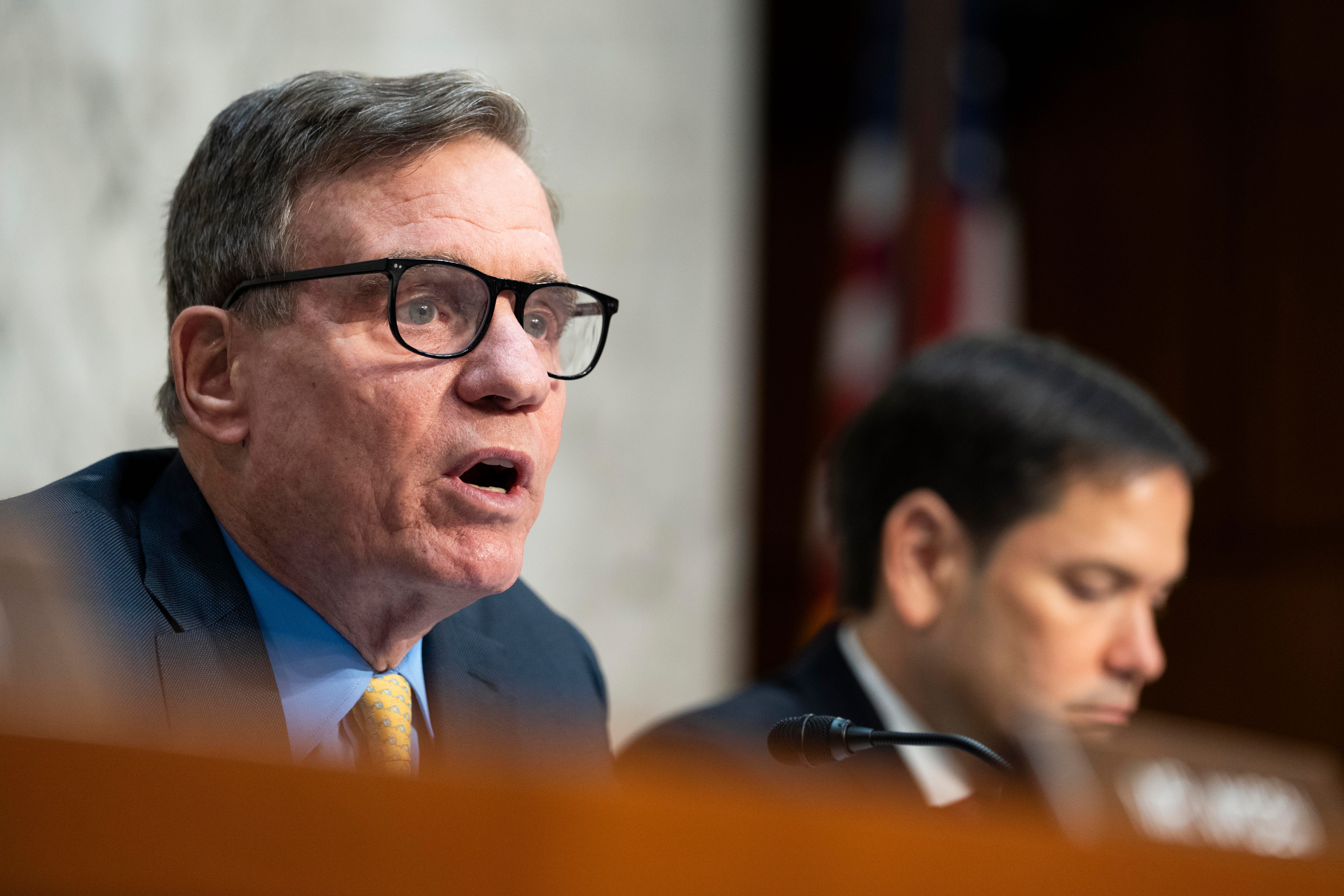 Mar 11, 2024; Washington, DC, USA; Sen. Mark Warner (R-Va.), chairman of the Senate Select Committee on Intelligence, speaks during a hearing on worldwide threats.. Mandatory Credit: Josh Morgan-USA TODAY