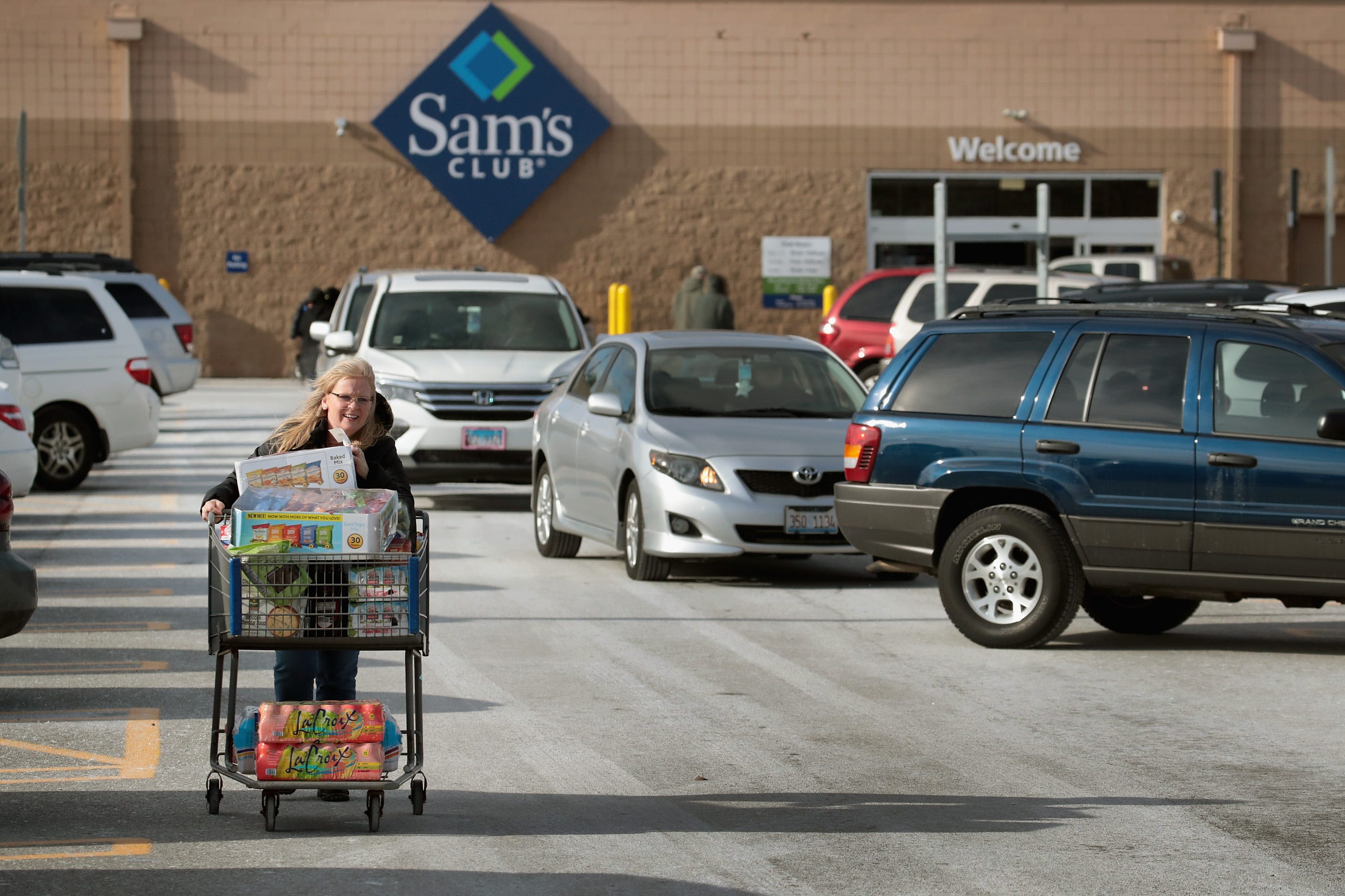 A shopper stocks up on merchandise at a Sam's Club store on January 12, 2018 in Streamwood, Illinois.