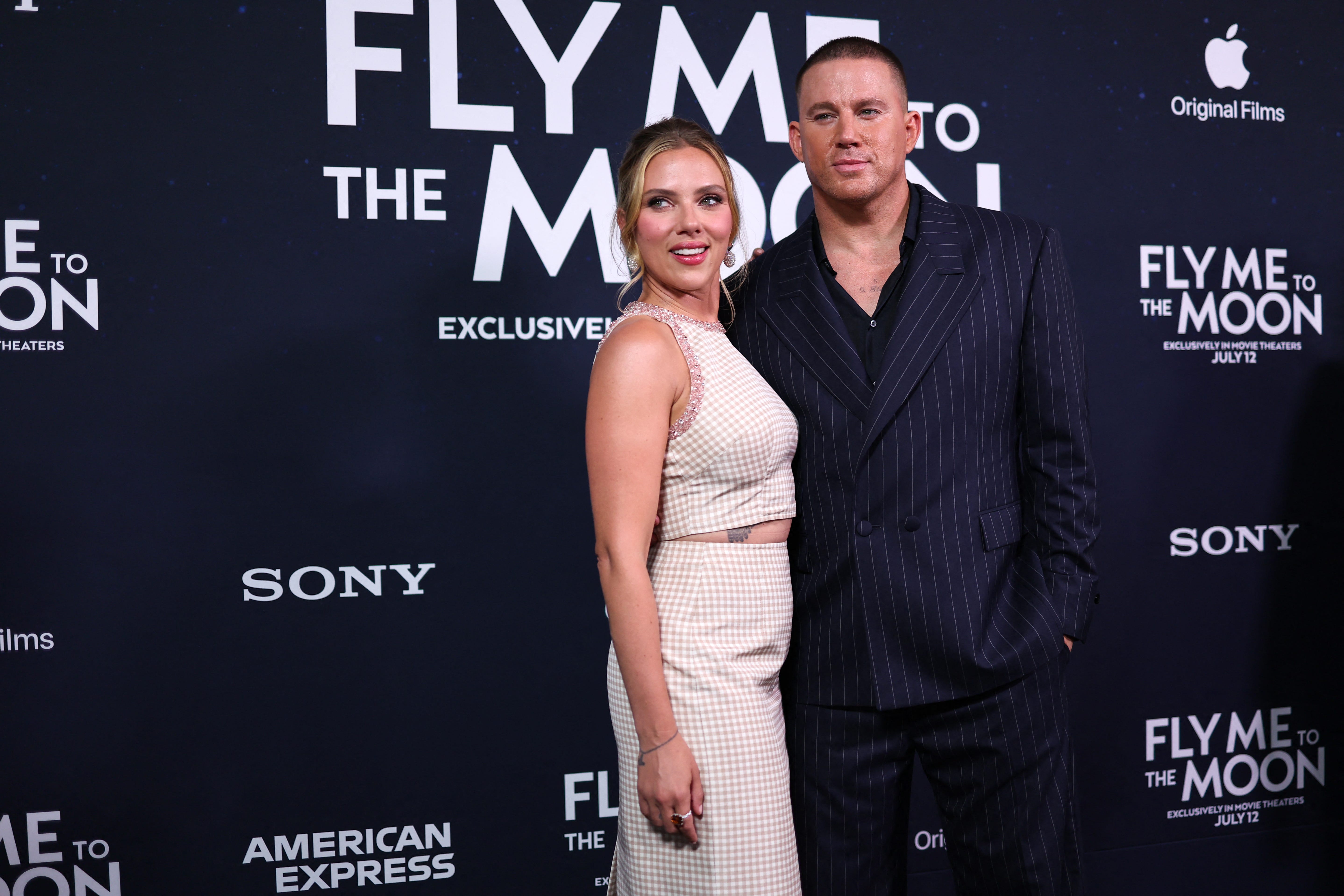 US actress Scarlett Johansson (L) and US actor Channing Tatum attend the world premiere of Apple Original Films' "Fly Me to the Moon" at AMC Lincoln Square in New York on July 8, 2024. (Photo by Charly TRIBALLEAU / AFP) (Photo by CHARLY TRIBALLEAU/AFP via Getty Images) ORG XMIT: 776165598 ORIG FILE ID: 2160625414