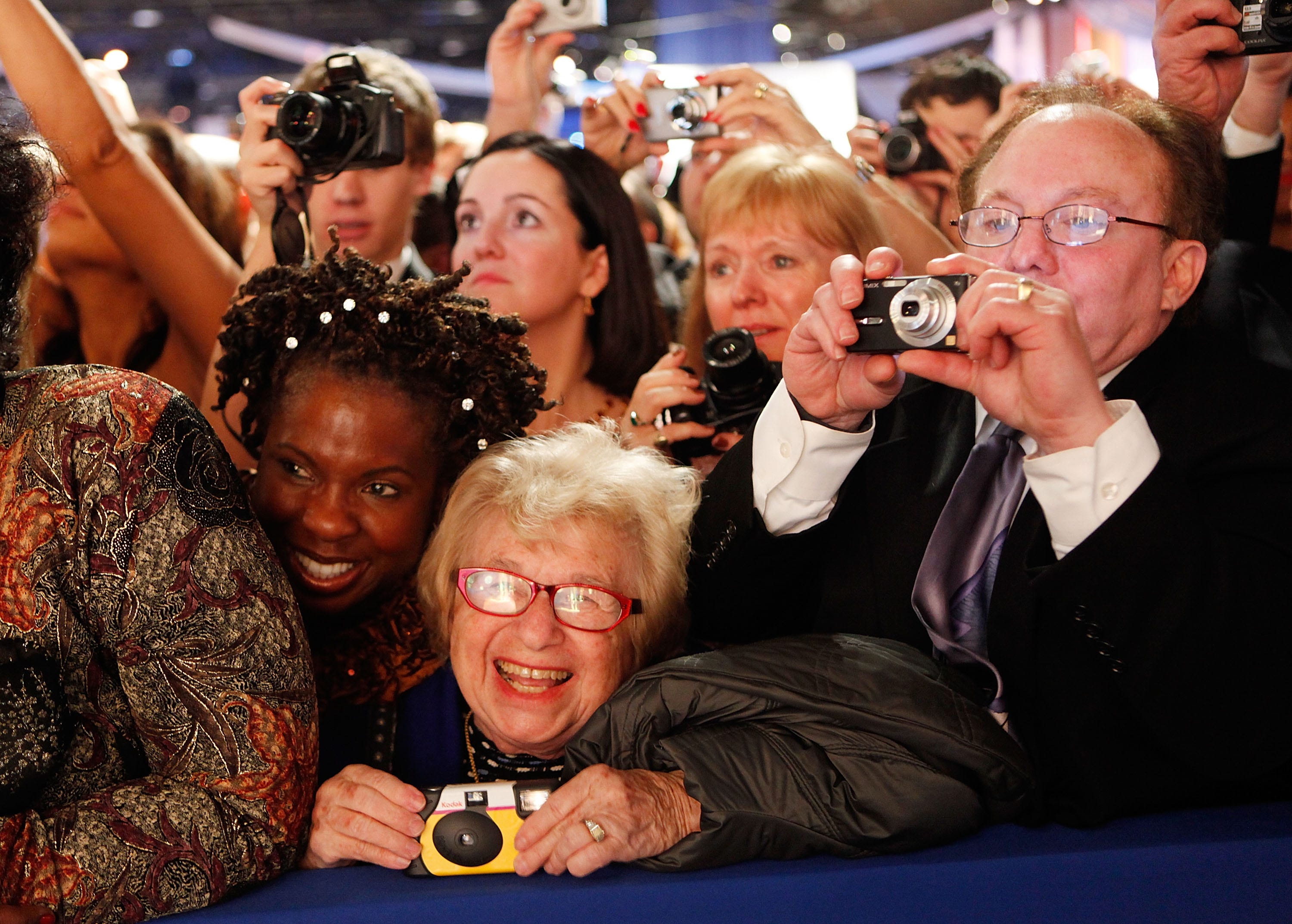 Dr. Ruth Westheimer (C) smiles as she watches President Barack Obama and First Lady Michelle Obama dance during the Western Inaugural Ball on Jan. 20, 2009 in Washington, D.C.