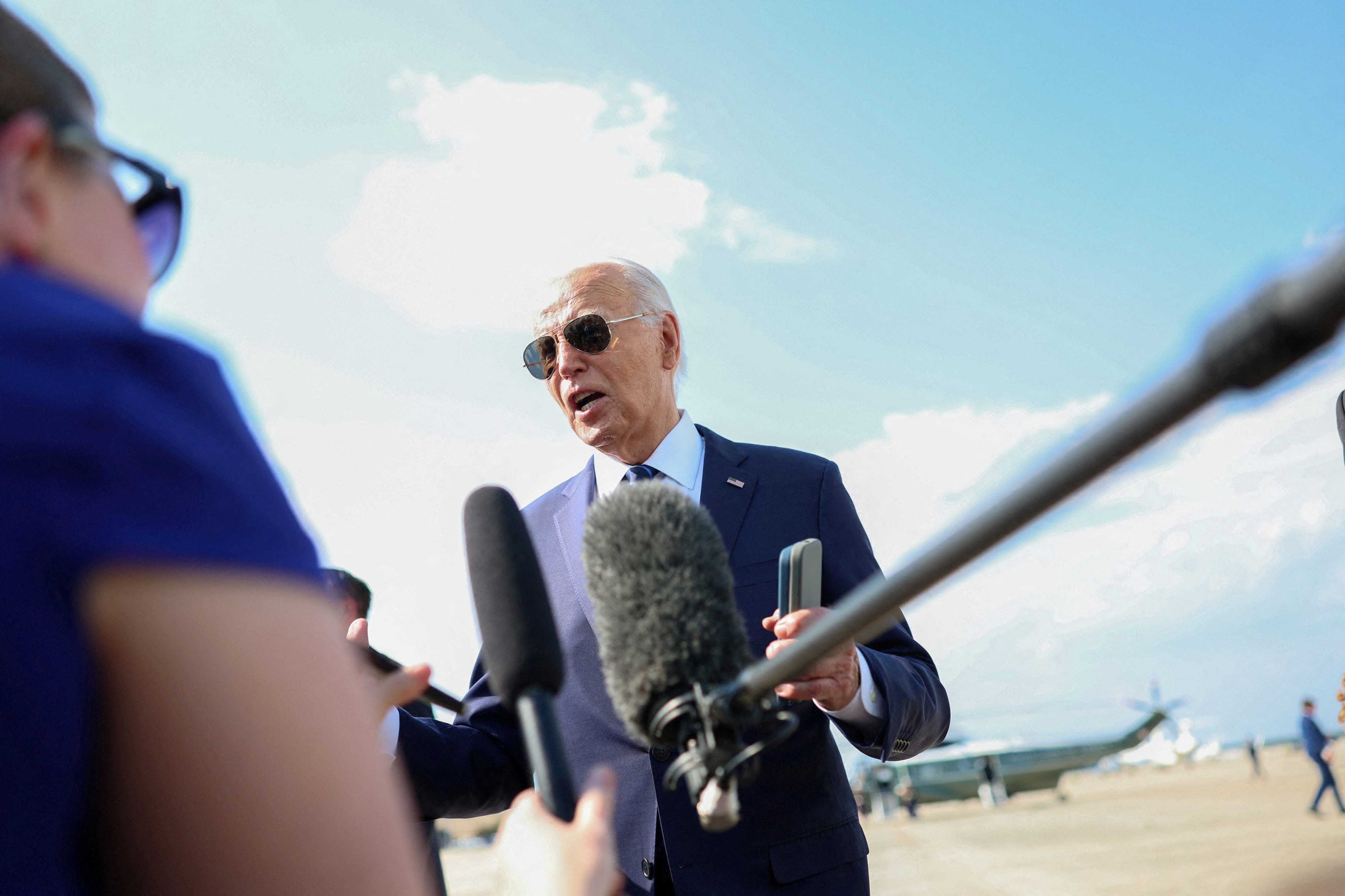 U.S. President Joe Biden speaks to journalists outside Air Force One at Joint Base Andrews in Maryland, U.S., July 15, 2024. REUTERS/Tom Brenner