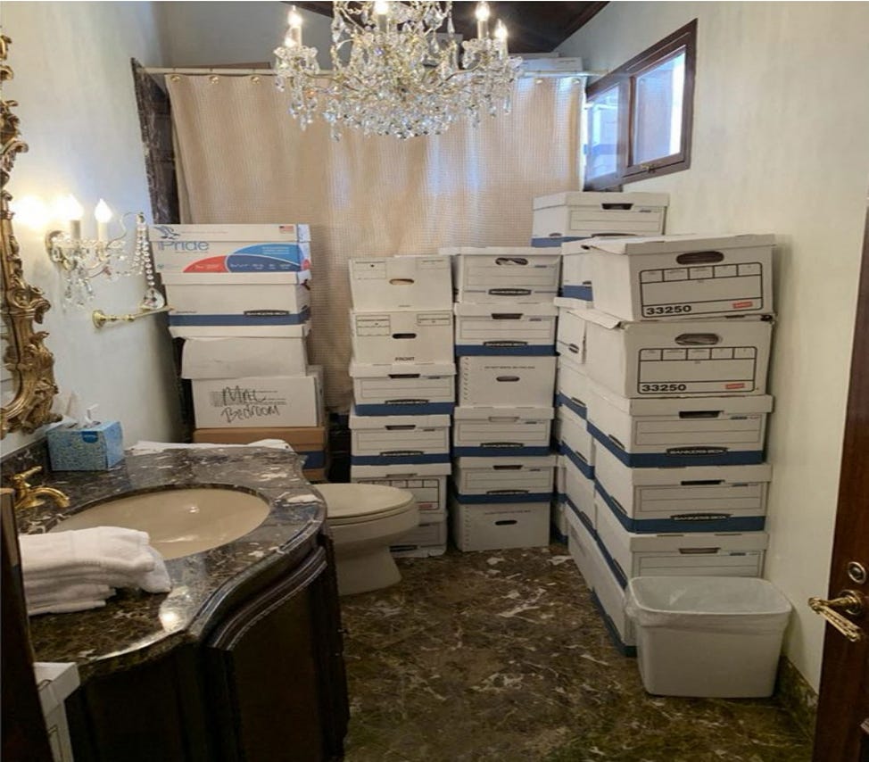 This undated file image, attached as evidence in the indictment against former President Donald Trump on classified documents, shows stacks of boxes in a bathroom and shower allegedly at his Mar-a-Lago estate in Florida.