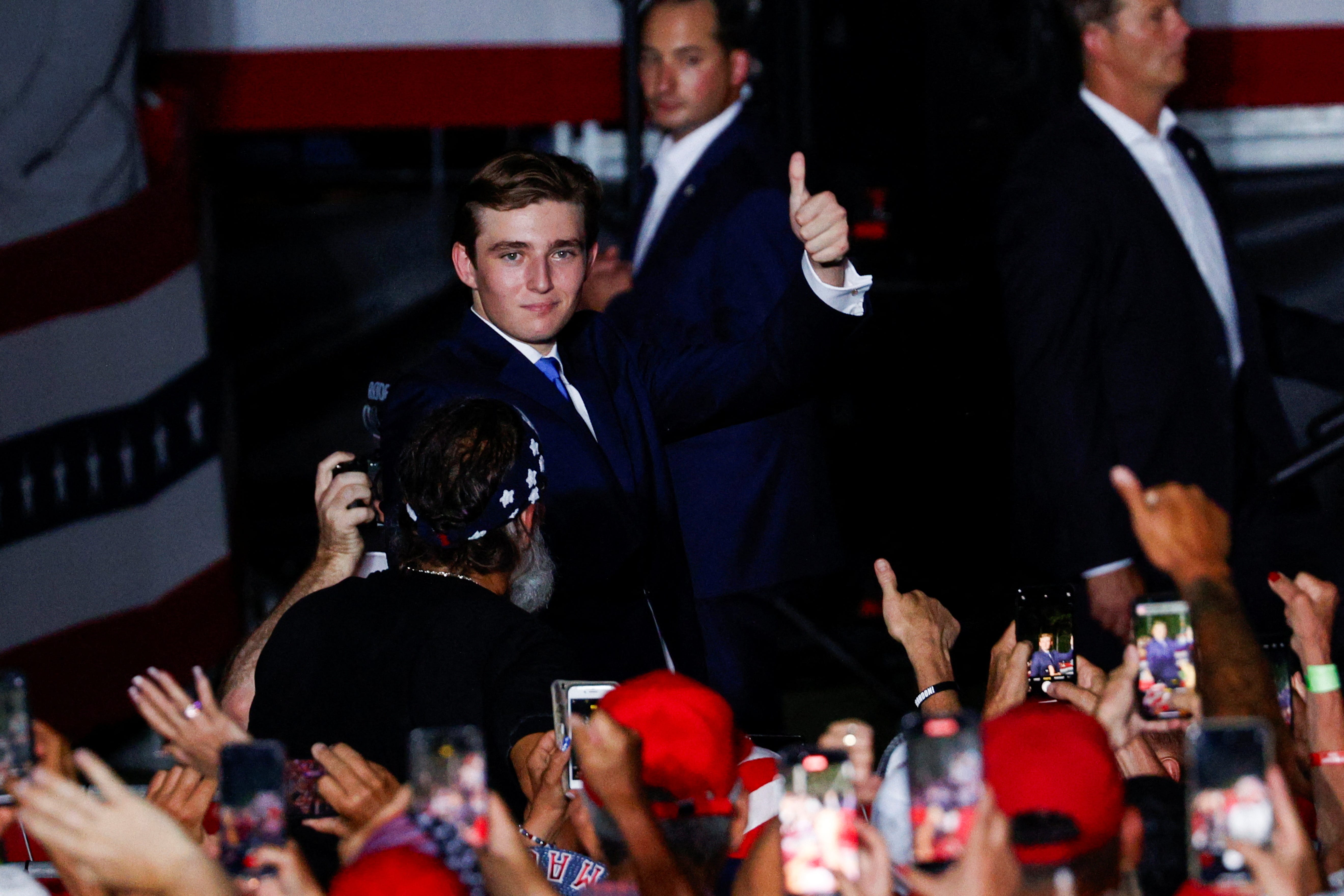 Barron William Trump, son of Republican presidential candidate and former U.S. President Donald Trump,gives a thumbs up at a campaign rally at Trump's golf resort in Doral, Florida, U.S., July 9, 2024. REUTERS/Marco Bello
