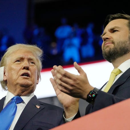 Former President Donald Trump with vice presidential nominee JD Vance during the second day of the Republican National Convention at the Fiserv Forum. The second day of the RNC focused on crime and border policies.
