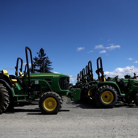 SANTA ROSA, CA - MAY 20: John Deere tractors are displayed at Belkorp Ag on May 20, 2016 in Santa Rosa, California. Illinois based Deere & Co. reported a 28.25 percent decline in second quarter net income with earnings of $495.4 million, or $1.56 per share, compared to $690.5 million, or $2.03 per share, one year ago. (Photo by Justin Sullivan/Getty Images)