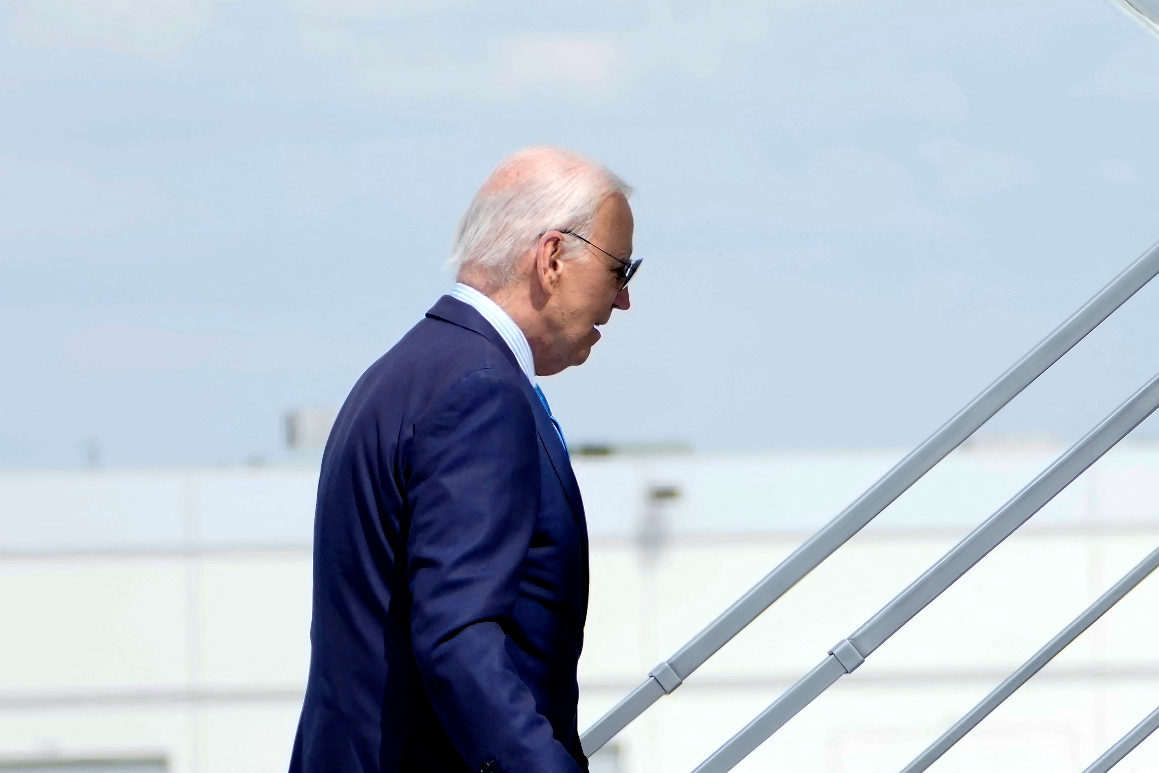 President Joe Biden boards Air Force One as he departs Harry Reid International Airport in Las Vegas, Nevada, on July 17, 2024, en route to Delaware.