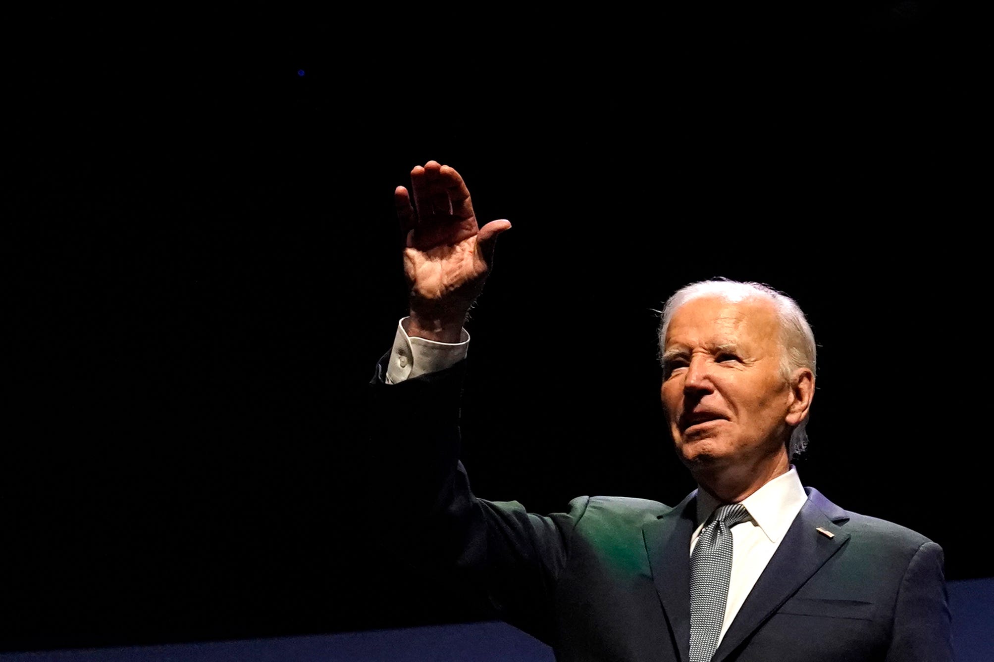 President Joe Biden waves on stage during the Vote To Live Prosperity Summit at the College of Southern Nevada in Las Vegas on July 16, 2024.