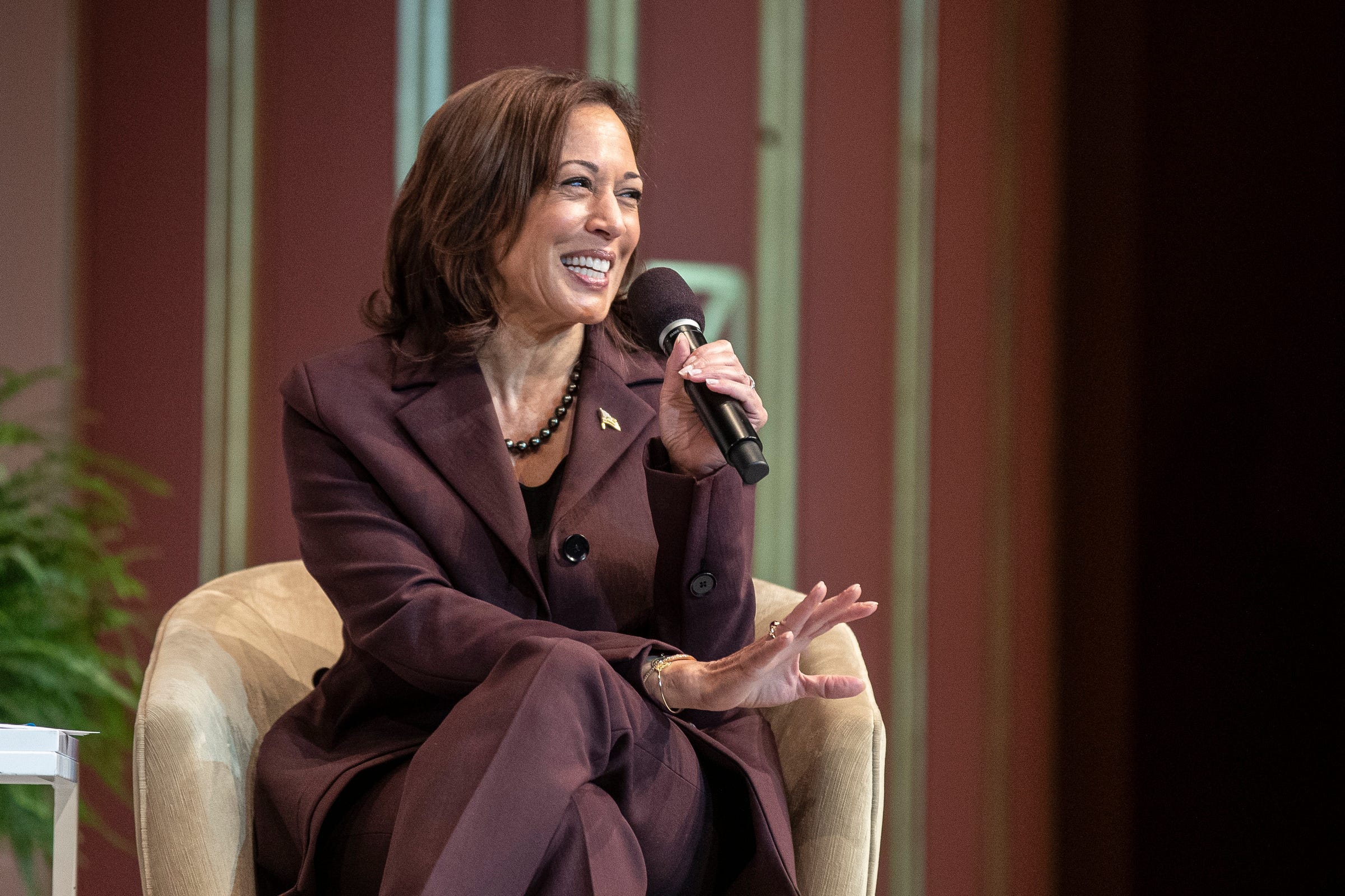 Vice President Kamala Harris speaks during a panel discussion of the Biden-Harris administration's response to climate crisis at U-M's Rackham Auditorium in Ann Arbor on Thursday, Jan. 12, 2023. She's joined by U.S. Secretary of Energy Jennifer Granholm and Kyle Whyte, Professor at the School for Environment and Sustainability.