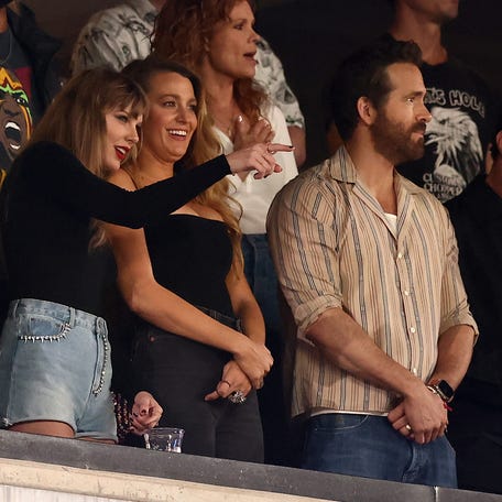 Taylor Swift, Blake Lively and Ryan Reynolds look on prior to the game between the Kansas City Chiefs and the New York Jets at MetLife Stadium on Oct. 01, 2023, in East Rutherford, New Jersey.