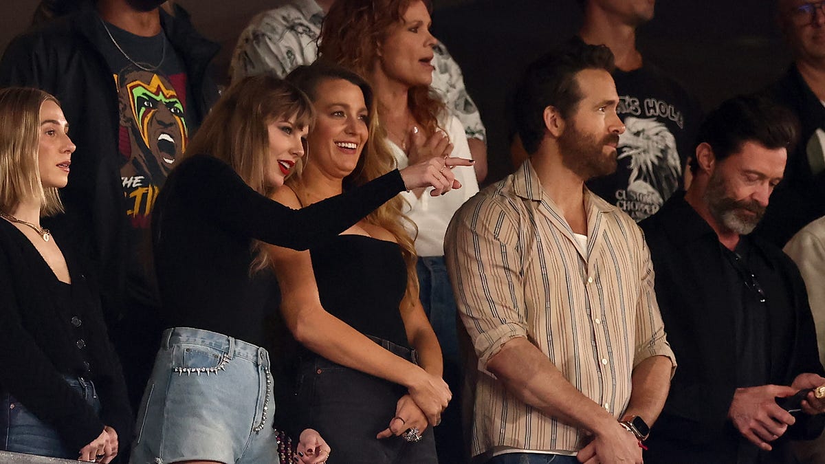 Taylor Swift, Blake Lively and Ryan Reynolds look on prior to the game between the Kansas City Chiefs and the New York Jets at MetLife Stadium on Oct. 01, 2023, in East Rutherford, New Jersey.