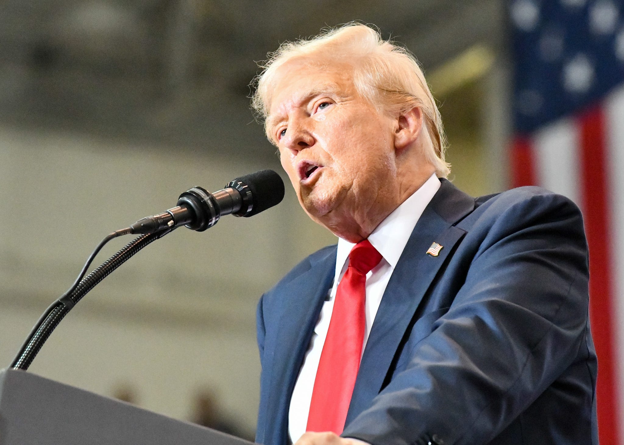 Former President Donald Trump poses at a campaign rally July 27 at the Herb Brooks National Hockey Center in St. Cloud, Minnesota. In his speech, Trump called on his supporters to flip the state red.