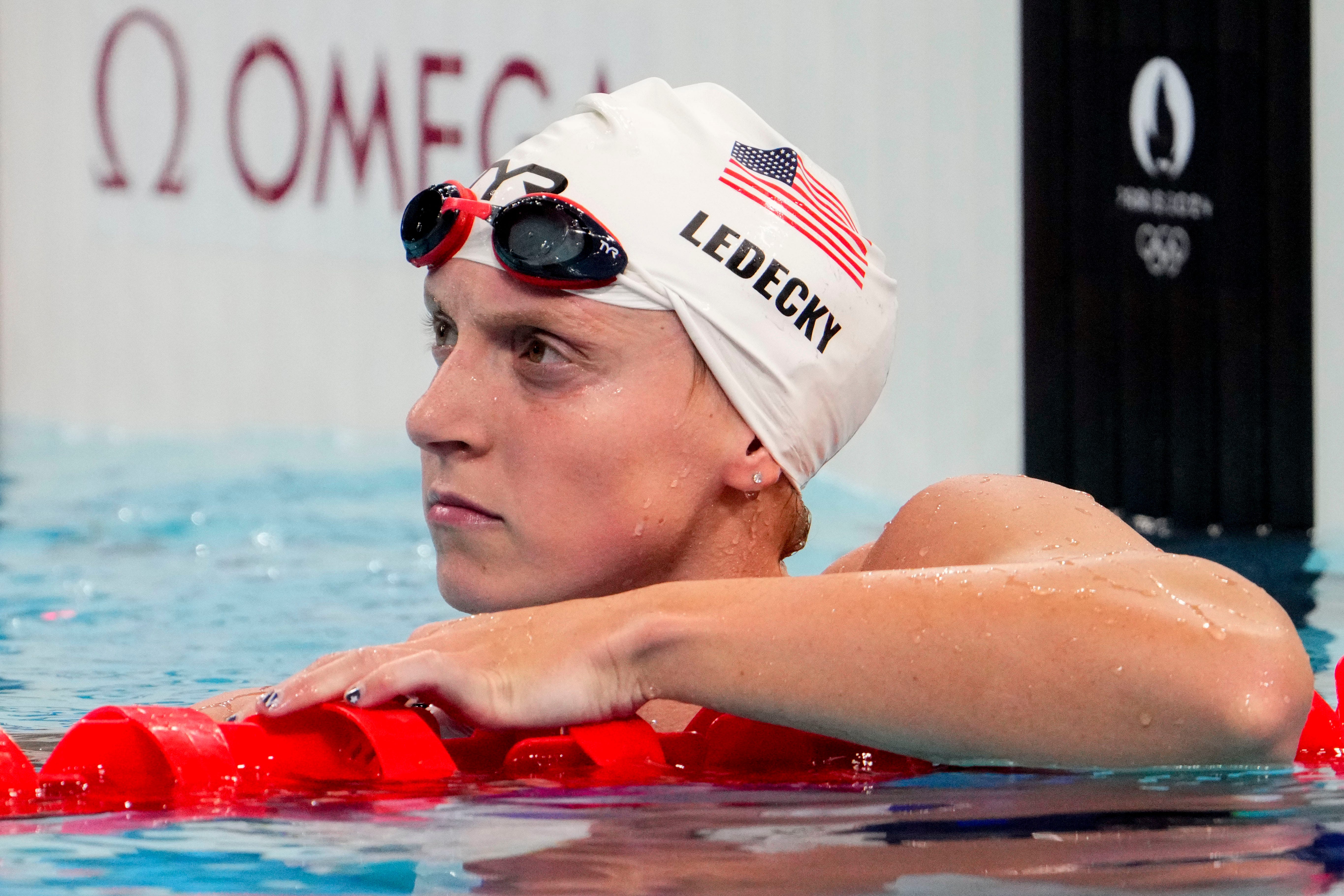 Katie Ledecky easily won her 1,500-meter freestyle preliminary heat at Paris La Défense Arena.