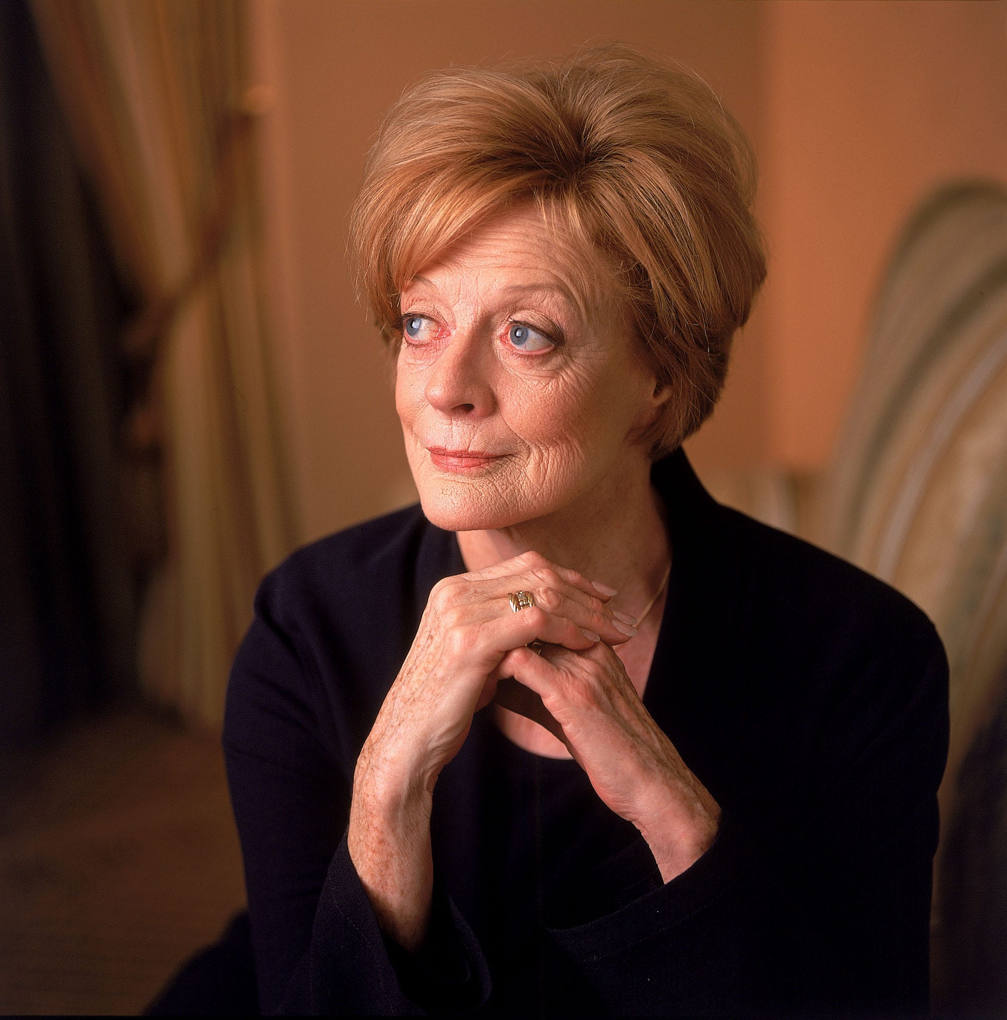 Dame Maggie Smith poses for a portrait in December 2001 while promoting Robert Altman comedy "Gosford Park."