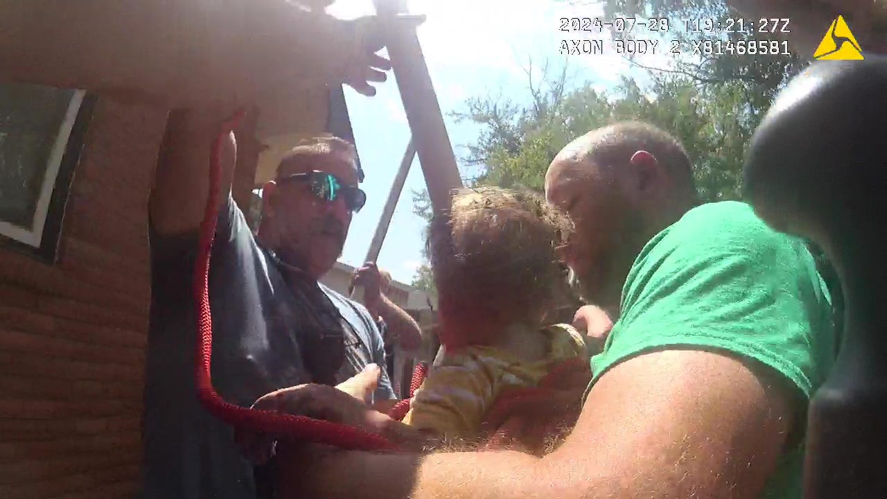Body cam footage shows first responders in Moundridge, Kansas, rescuing a 14-month-old boy who had fallen into a 10-12-foot hole on July 28, 2024.