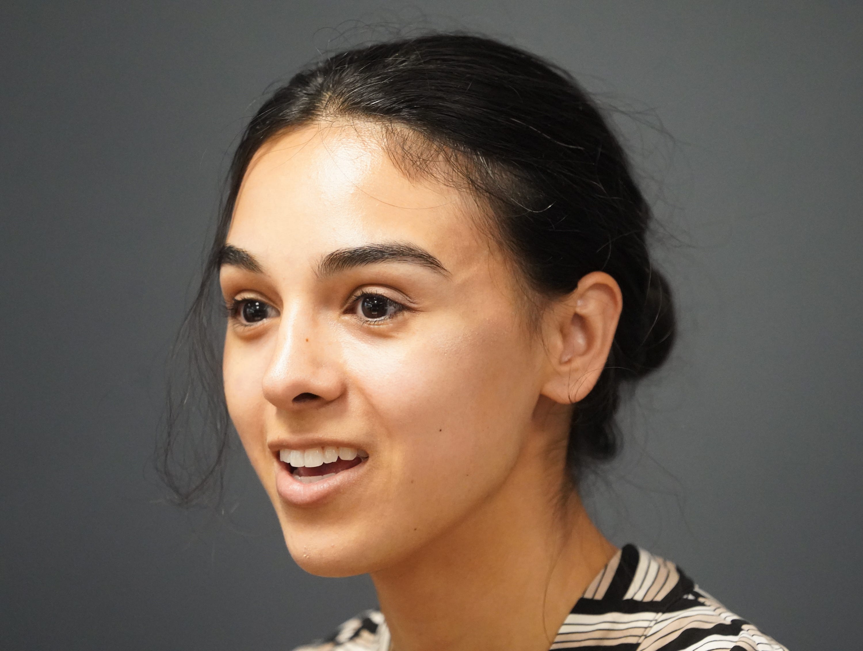 Team Monocle member Sophia Delgado is interviewed about the innovative startup group using AI to solve cold cases at an undisclosed location on Monday, July 29, 2024 in Indiana.