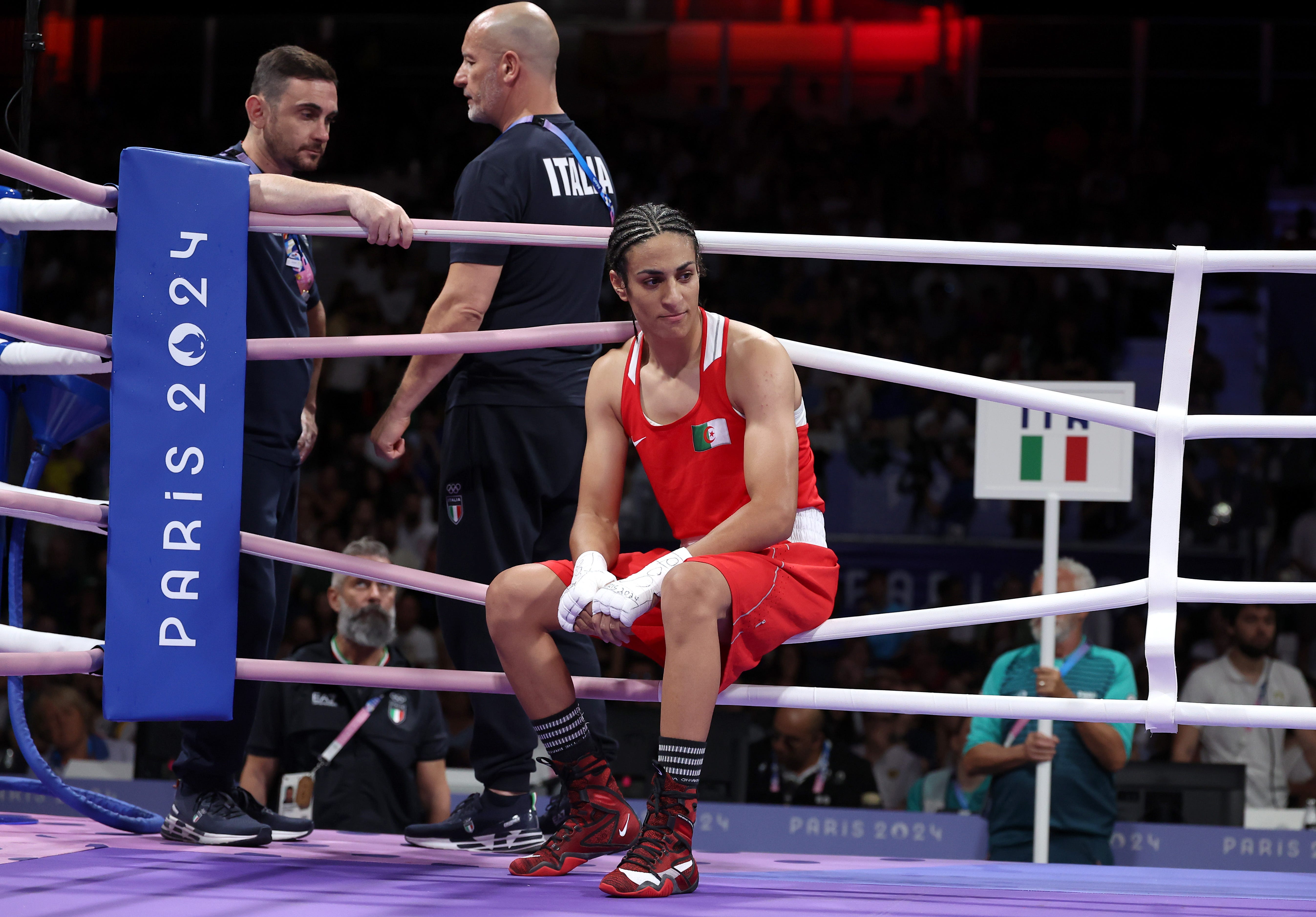 Imane Khelif of Team Algeria looks on after Angela Carini of Team Italy abandons the women's 66kg preliminary round match at the Paris Olympics.
