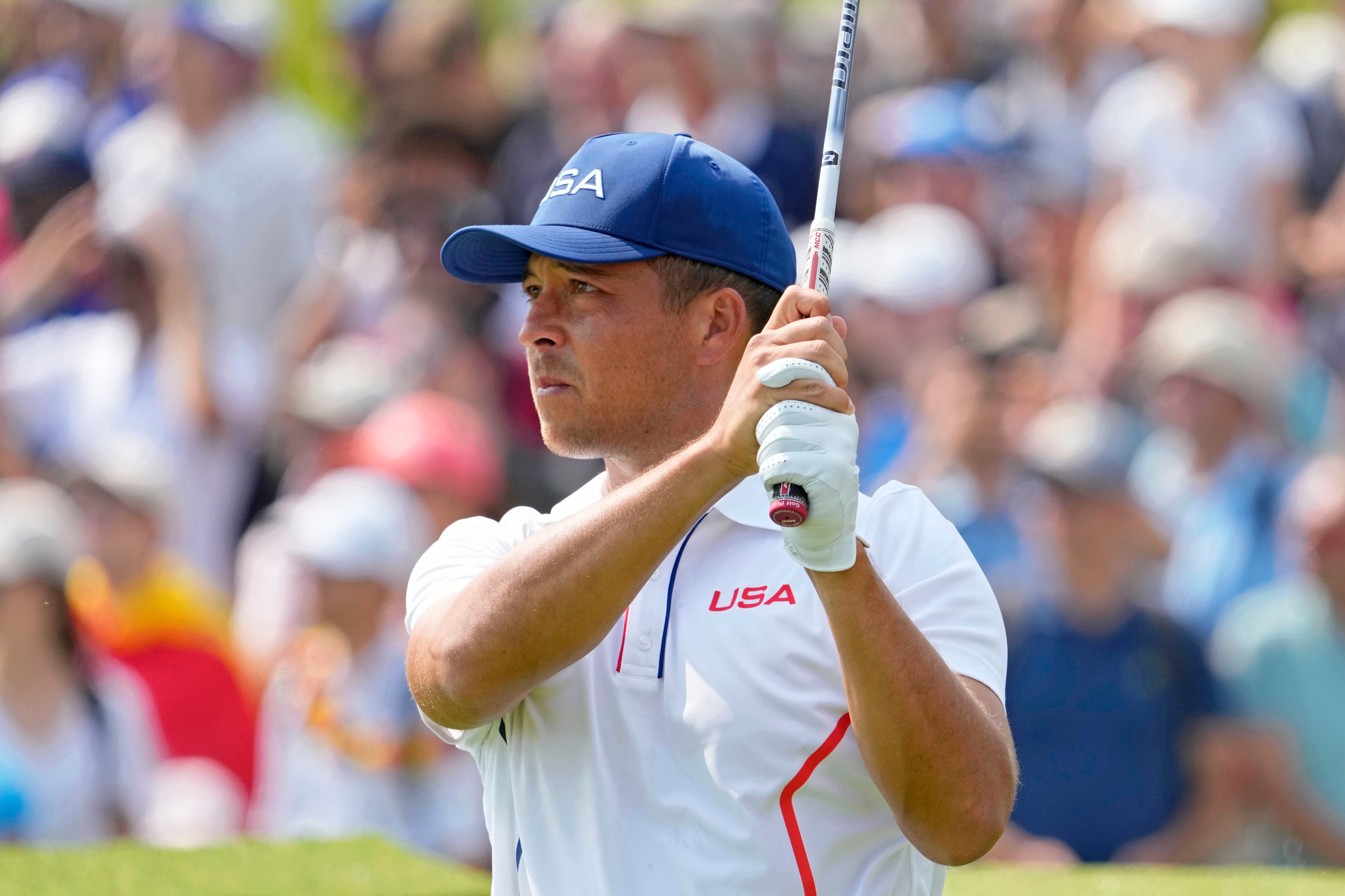 Aug 2, 2024; Xander Schauffele of the US tees off on the seventh hole in round two of men's stroke play.