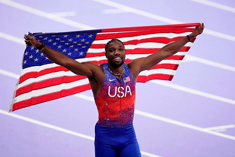 Noah Lyles (USA) celebrates after winning the men's 100m final during the Paris 2024 Olympic Summer Games at Stade de France.