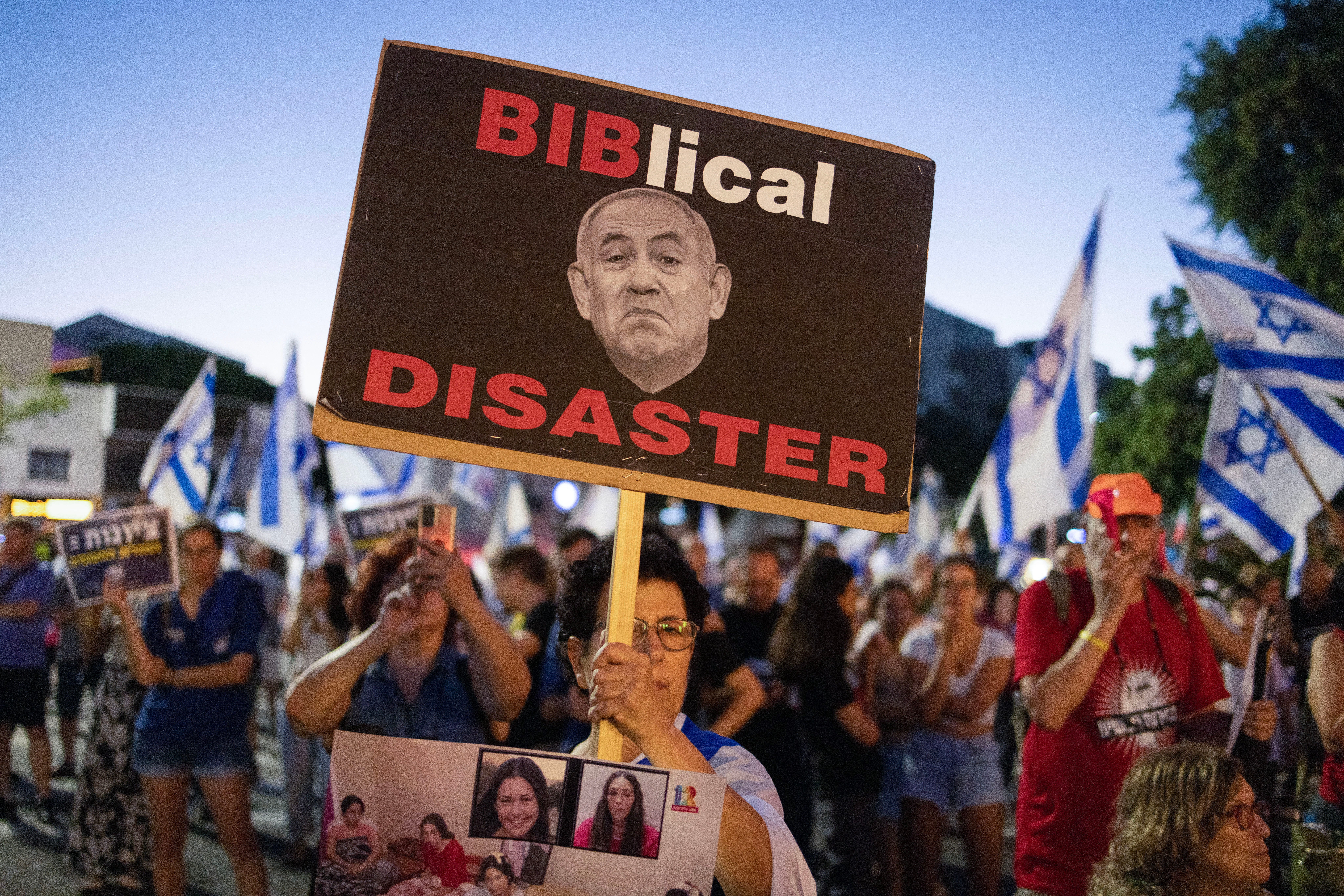Israeli protesters in the coastal city of Haifa on Aug. 3, 2024, call for Prime Minister Benjamin Netanyahu to bring home hostages still held in Gaza, after Hamas attacked Israel on Oct. 7, 2023.