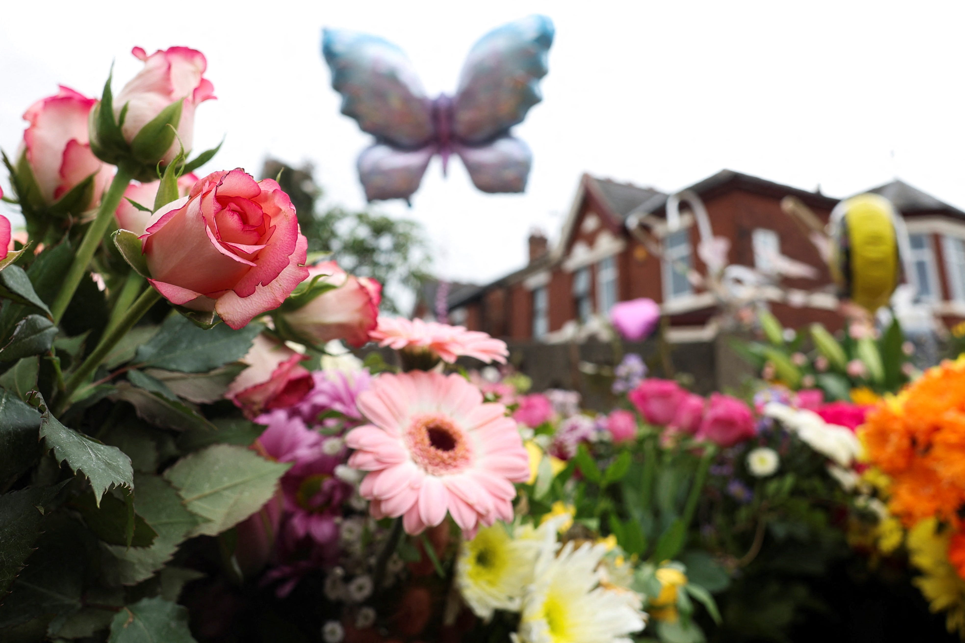 Floral tributes lie near the scene where a teenage suspect was arrested after children were stabbed in Southport, Britain, August 5, 2024. REUTERS/Manon Cruz