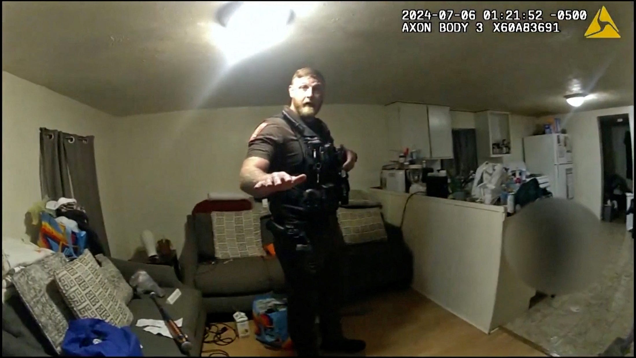 Sangamon County Sheriff's Deputy Sean Grayson speaks with his partner after shooting Sonya Massey, during a call for help at her home July 6 captured on a still photograph from body camera video released by the Illinois State Police July 22, 2024.