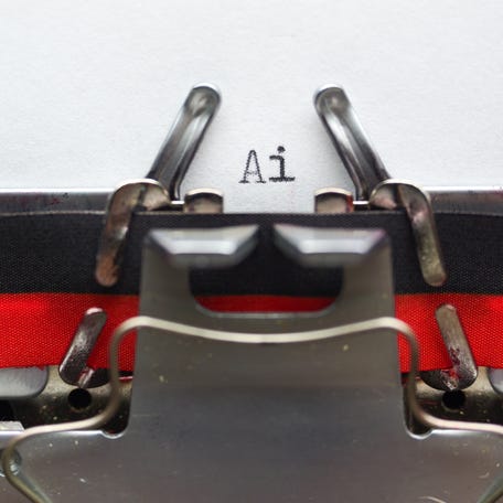 Typing Ai letter on vintage typewriter