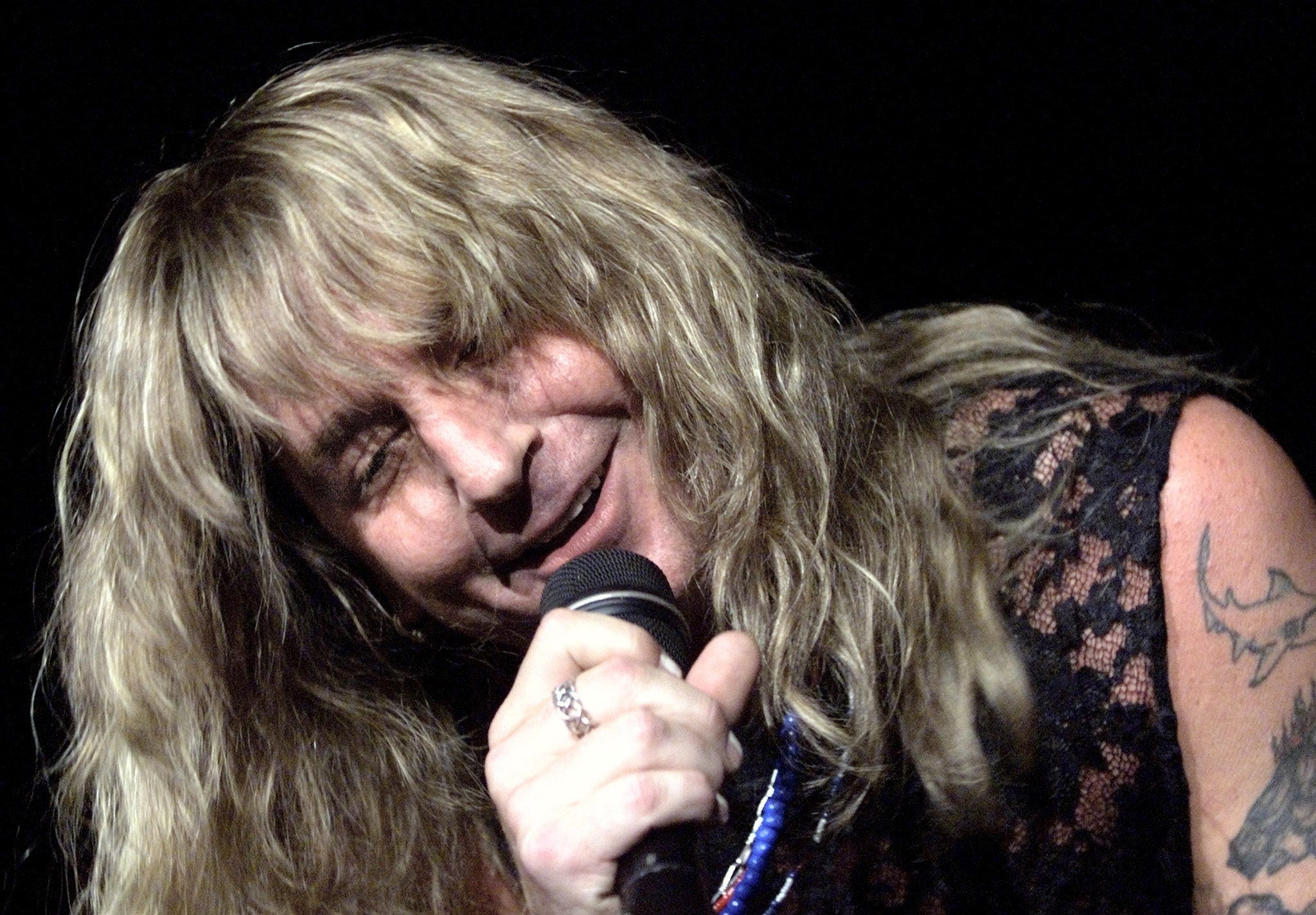 Great White singer Jack Russell sings during a performance at the Star of the Desert Arena at Buffalo Bill's Resort & Casino in Primm, Nevada, Sept. 2, 1999.
