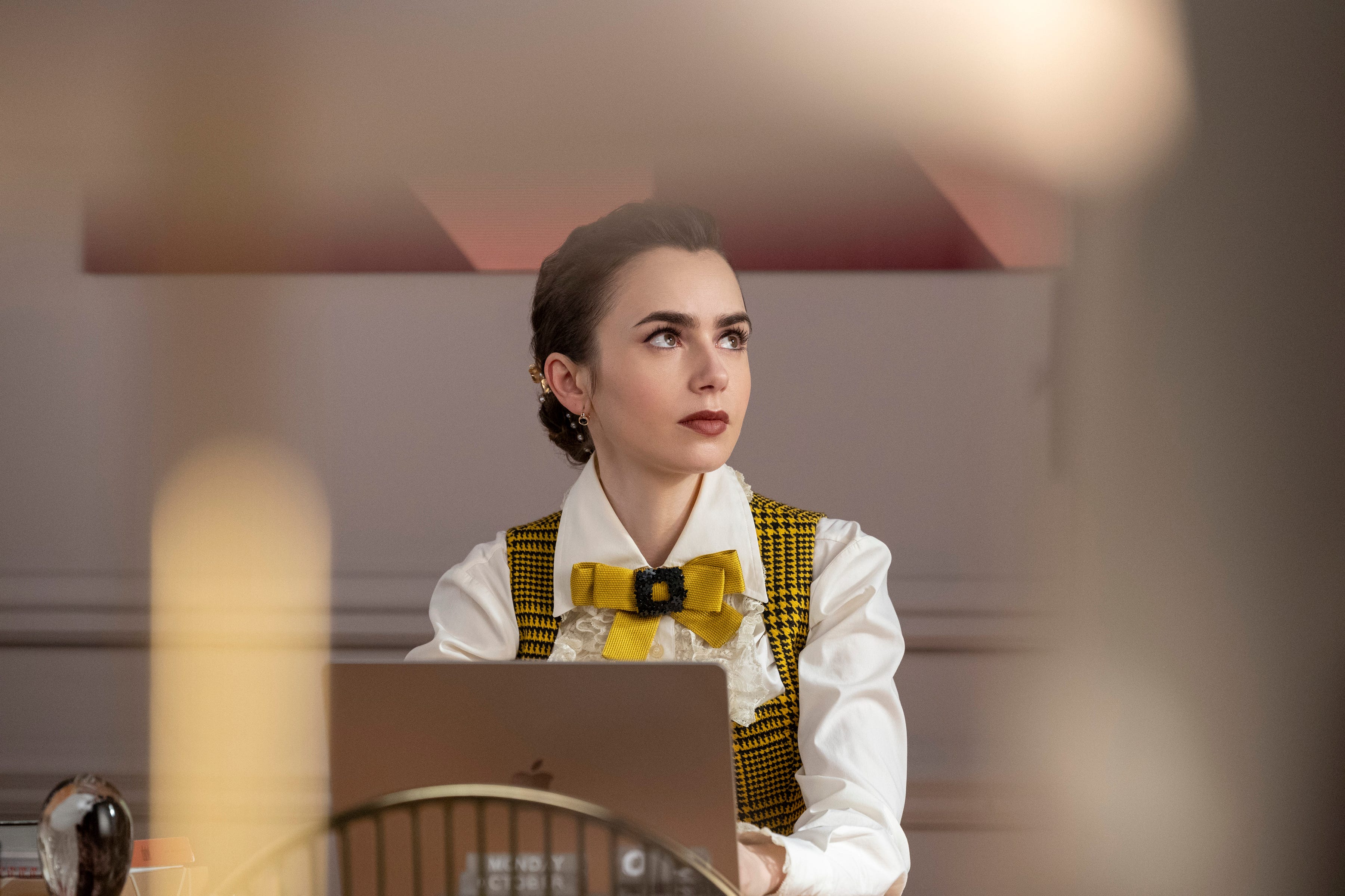 Emily in Paris. Lily Collins as Emily in episode 404 of Emily in Paris. Cr. Stephanie Branchu/Netflix © 2024