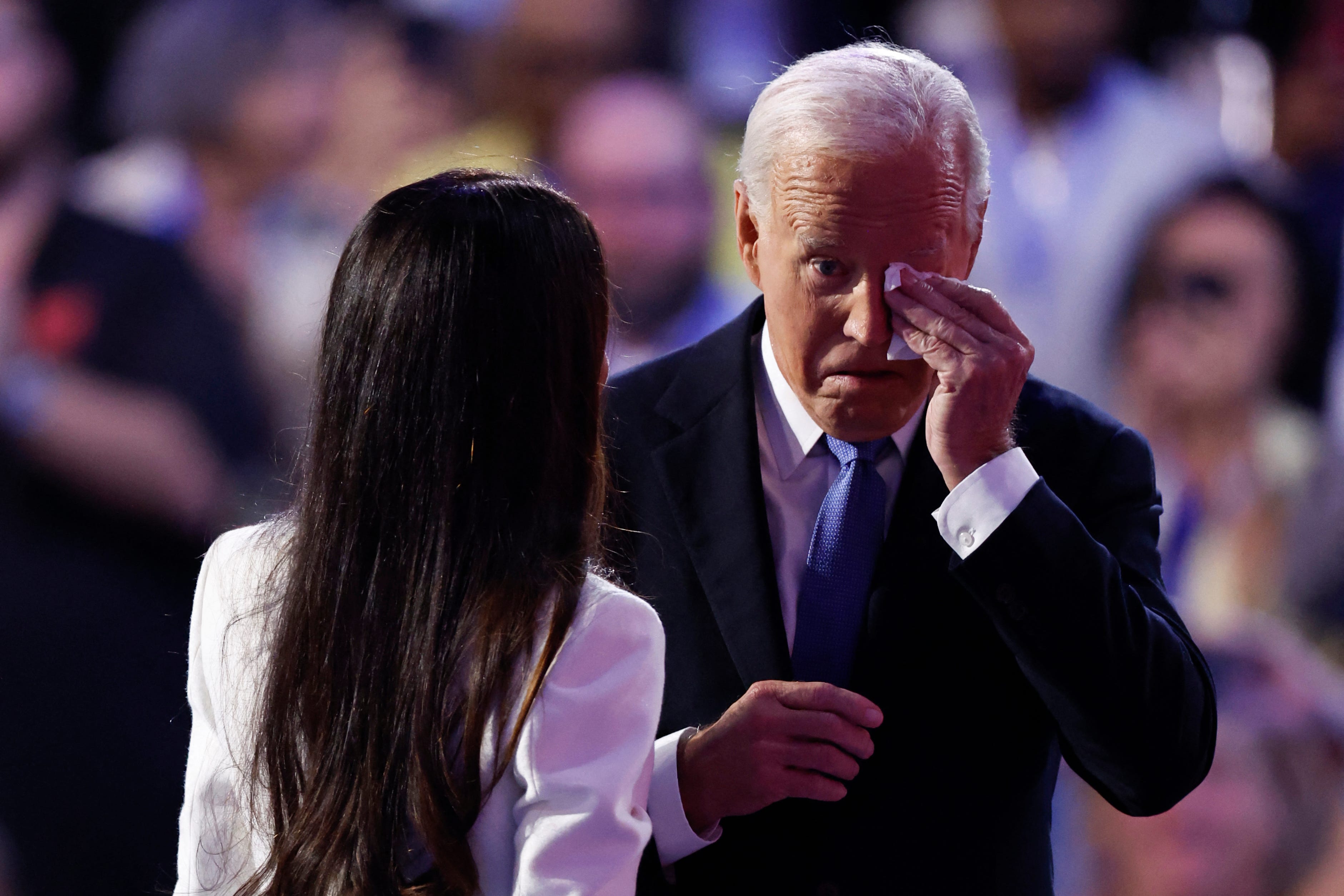 After his daughter, Ashley Biden, introduces him at the first day of the Democratic National Convention in Chicago on Aug. 19, 2024, President Joe Biden wipes his eyes before addressing the convention.