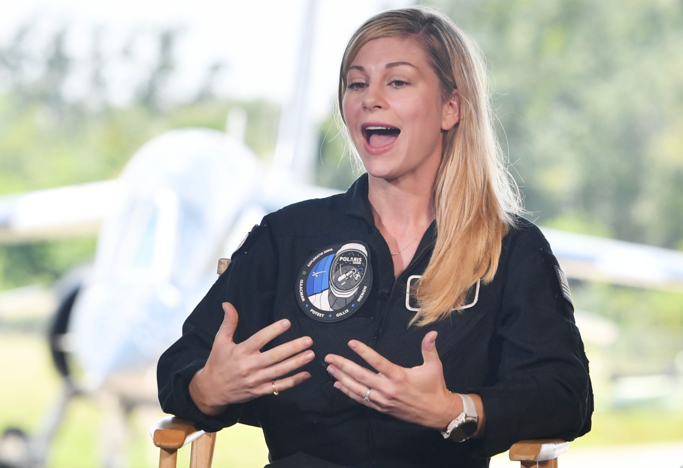 Polaris Dawn mission specialist Anna Menon answers questions Monday, Aug. 19 at a media briefing at Kennedy Space Center in Florida. Menon, a SpaceX lead space operations engineer, has written a children's book, "Kisses from Space," which was inspired by her experience preparing for the Polaris Dawn mission and her desire to share her spaceflight experience with her two young children. She plans to read it from space during the mission.