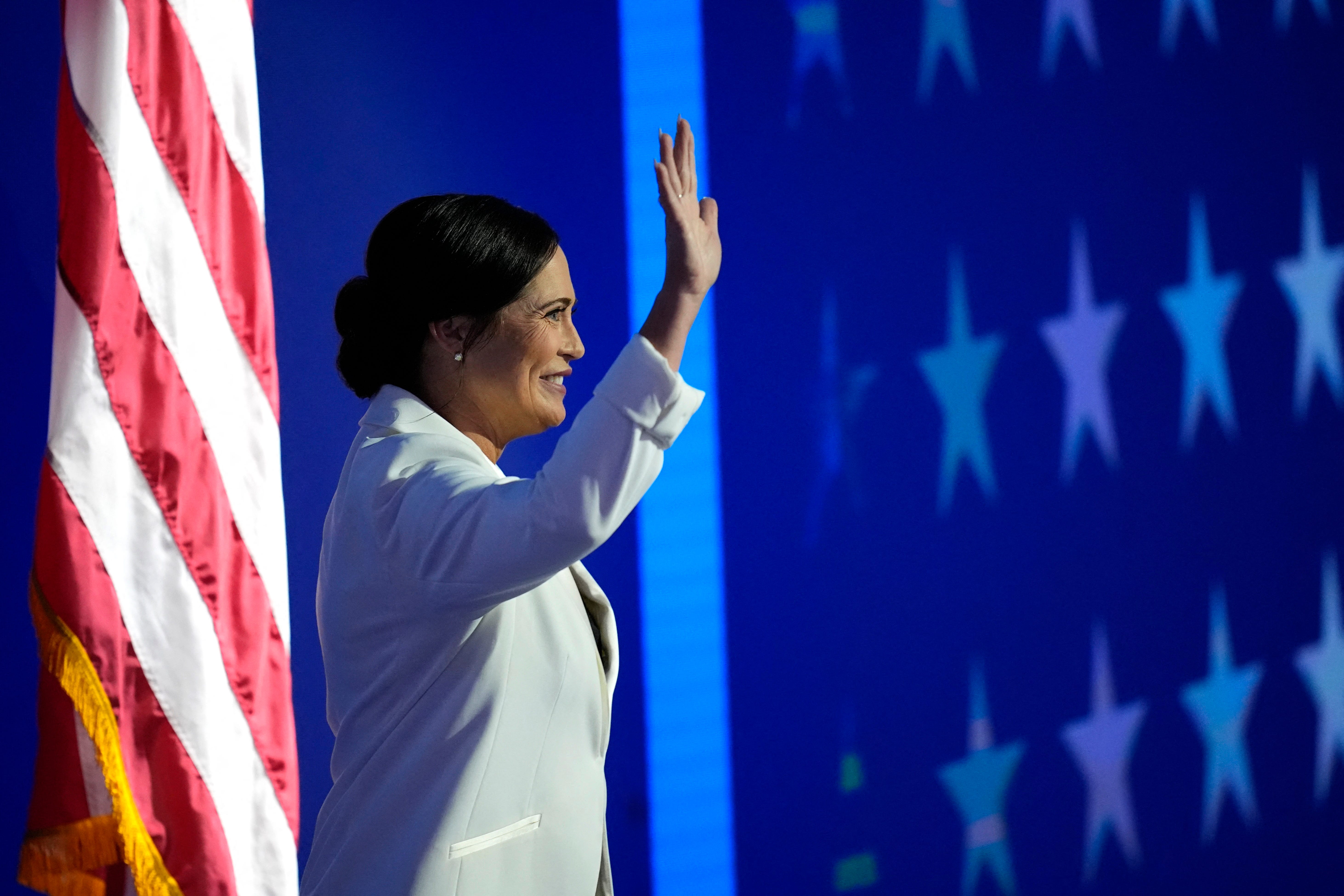 Stephanie Grisham, former White House Press Secretary under former U.S. President Donald Trump, waves to the audiennce on Day 2 of the Democratic National Convention (DNC) in Chicago, Illinois, U.S., August 20, 2024. REUTERS/Elizabeth Frantz