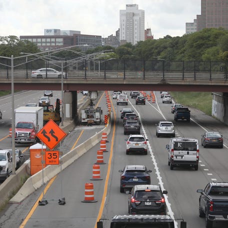 Morning commute traffic slows to a crawl on Interstate 490 west bound into downtown Rochester as lane reductions are in place around the Alexander Street bridge for construction on the bridge, Wednesday, Aug. 21, 2024.