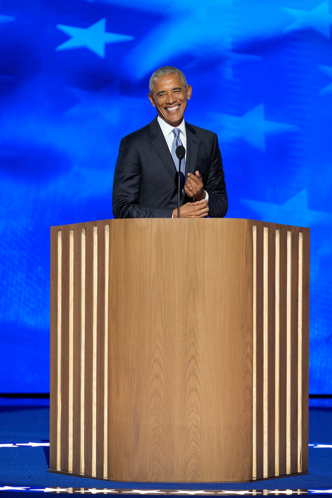 Former President Barack Obama takes the stage during the second day of the Democratic National Convention at the United Center.