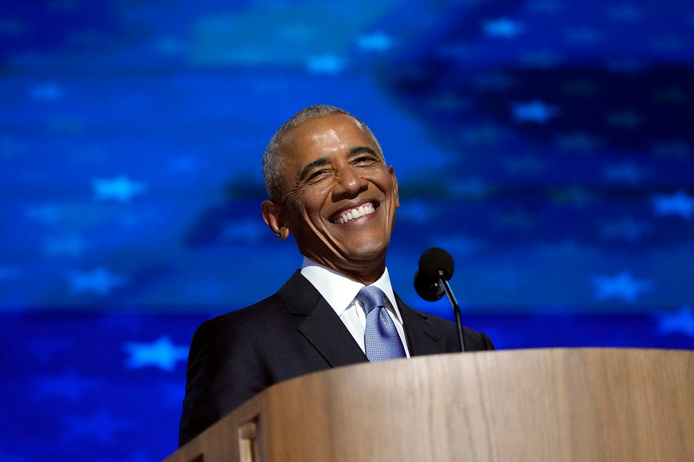 Former President Barack Obama speaks during the second day of the Democratic National Convention at the United Center.