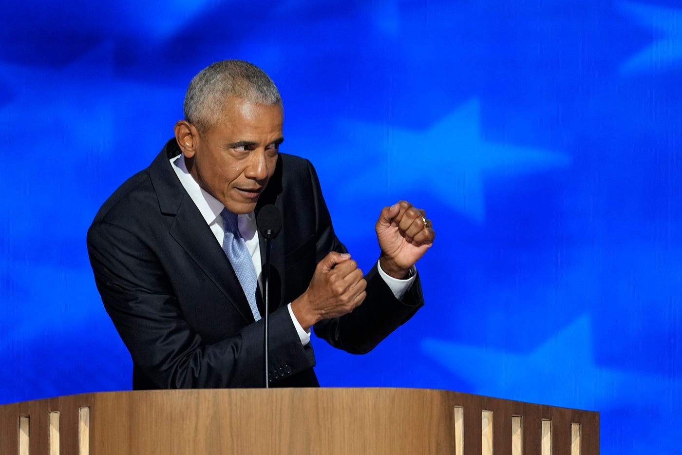 Former President Barack Obama speaks during the second day of the Democratic National Convention at the United Center.